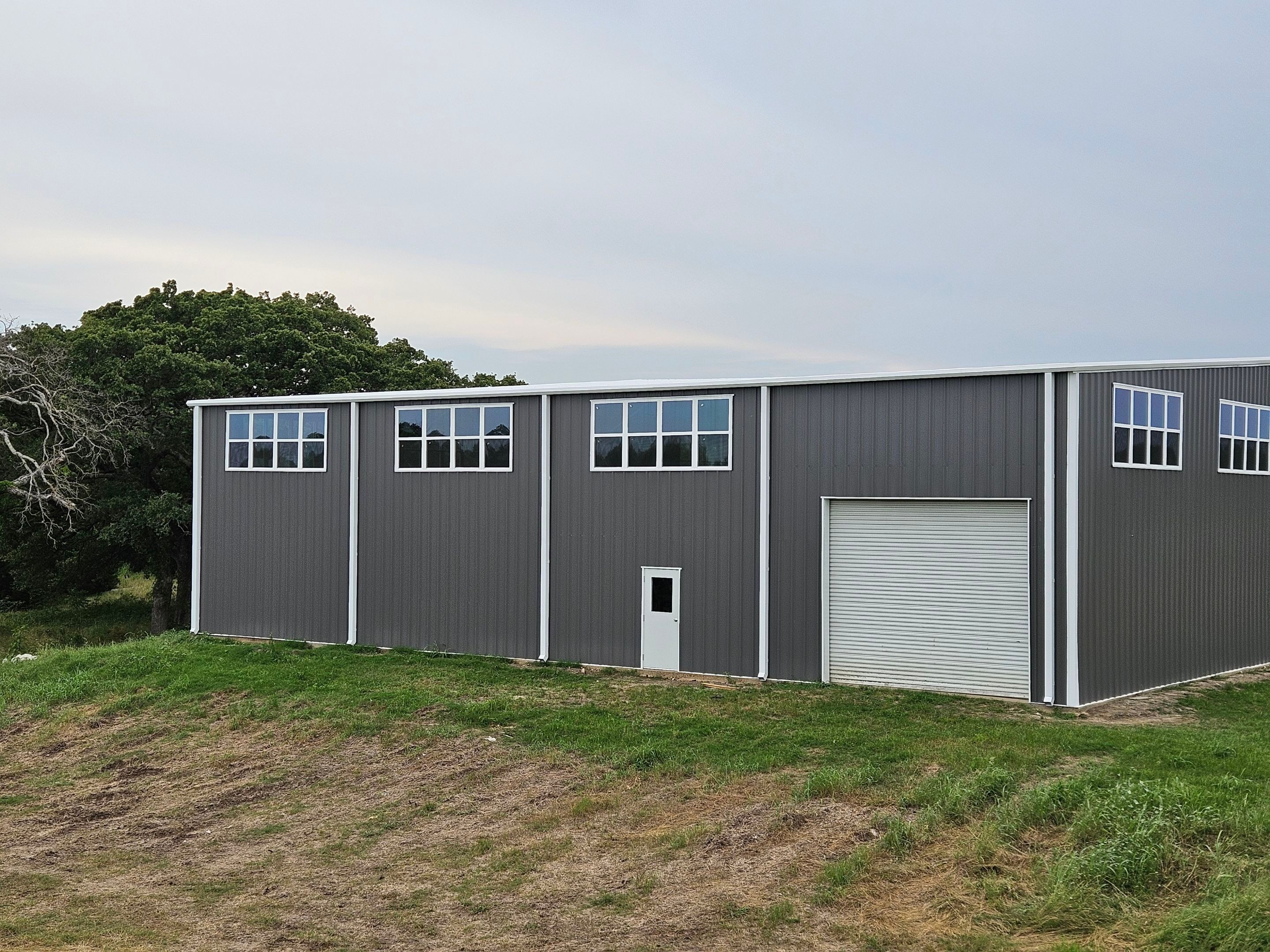 Complete Restoration with Skylight/Window Install - Greenville, TX by Hostetler Roofing