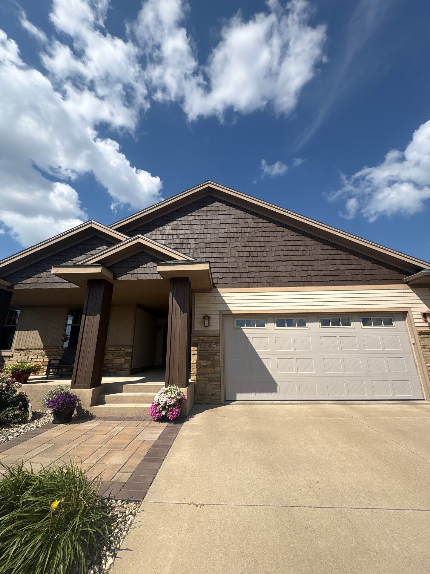 Sioux Falls Exterior Refresh and Multi-Level Deck Maintenance by Select Painting, Coatings & Garage Cabinets