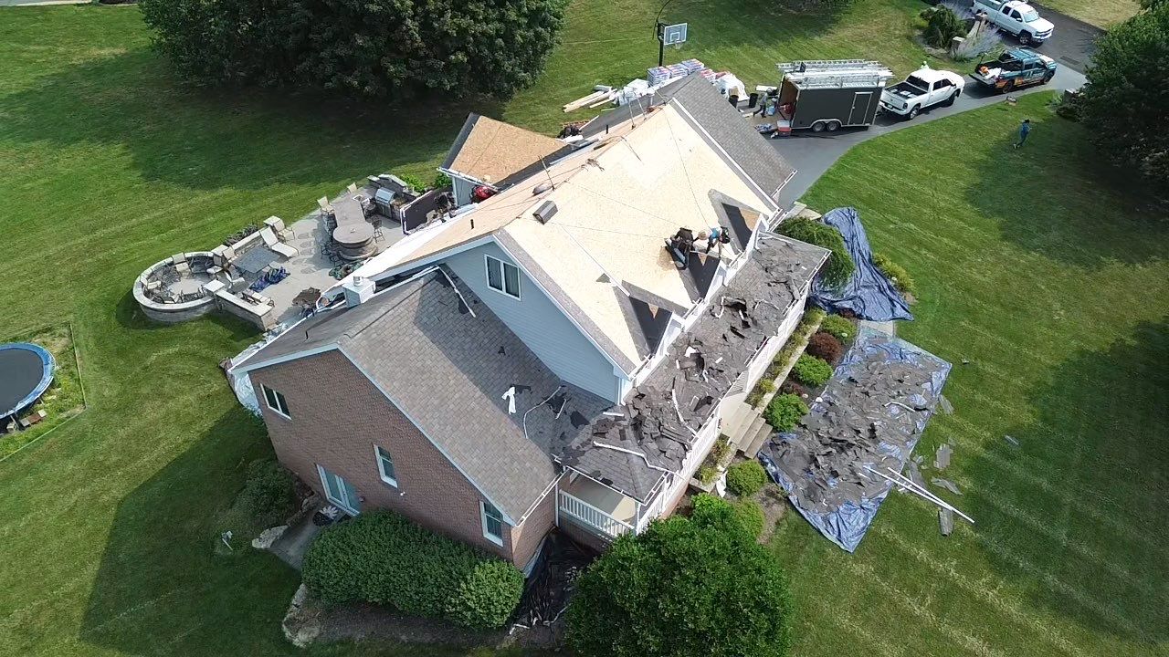 Full Roofing Replacement and Gray Shake Hardie Siding Installation in Butler by Cousins Roofing Siding & Decks