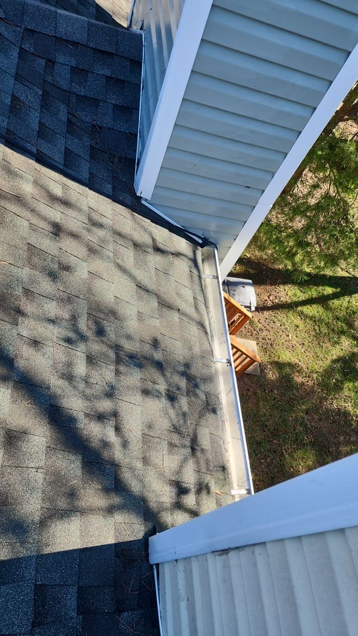 Gutter Cleaning using water by Power Wash Masters LLC