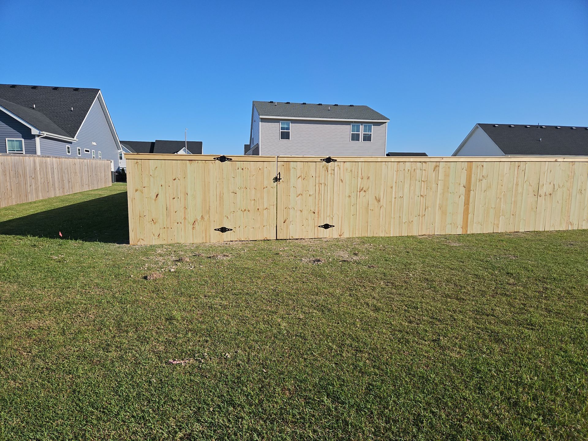 Stronger. Sleeker. Wood. by Tidewater Fence