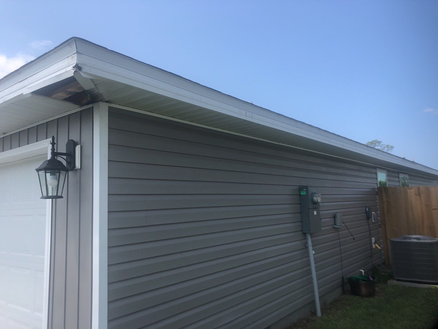 Gutter Installation using K-Style Seamless Gutters and Soffit and Fascia Replacement by Gutter Professors