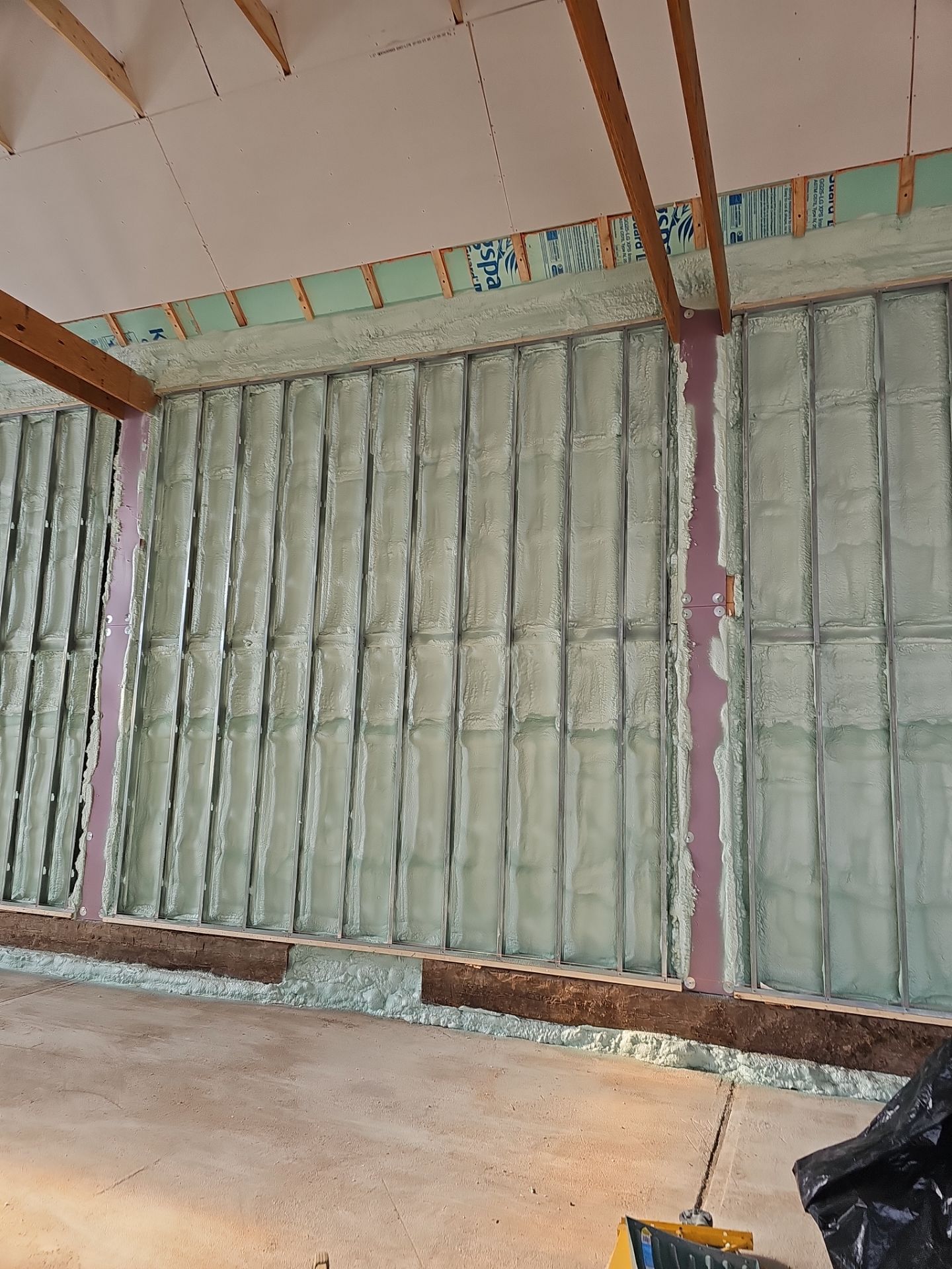 Exterior Installation using Closed Cell Spray Foam by NYS Foam & Energy