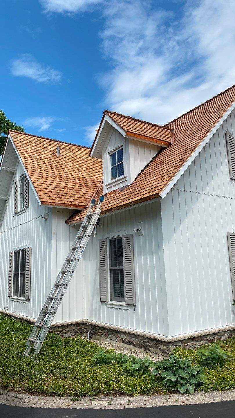 Cedar Shake Roof Replacement with Half Round Gutter Installation by Custom Installations