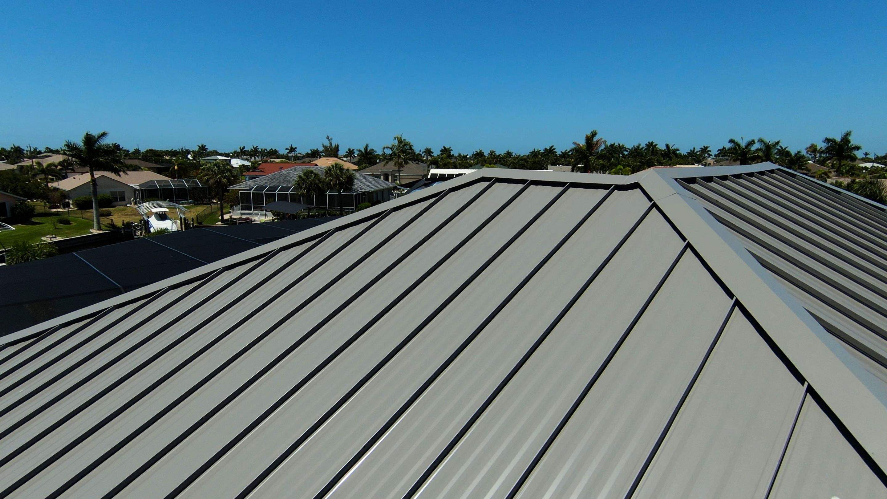 Residential Roofing Installation using Gulf Coast Metals Gulf Seam Panels by Four Peaks Roofing