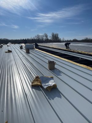 Commercial Roofing Installation using 24 Guage Double Lock Standing Seam