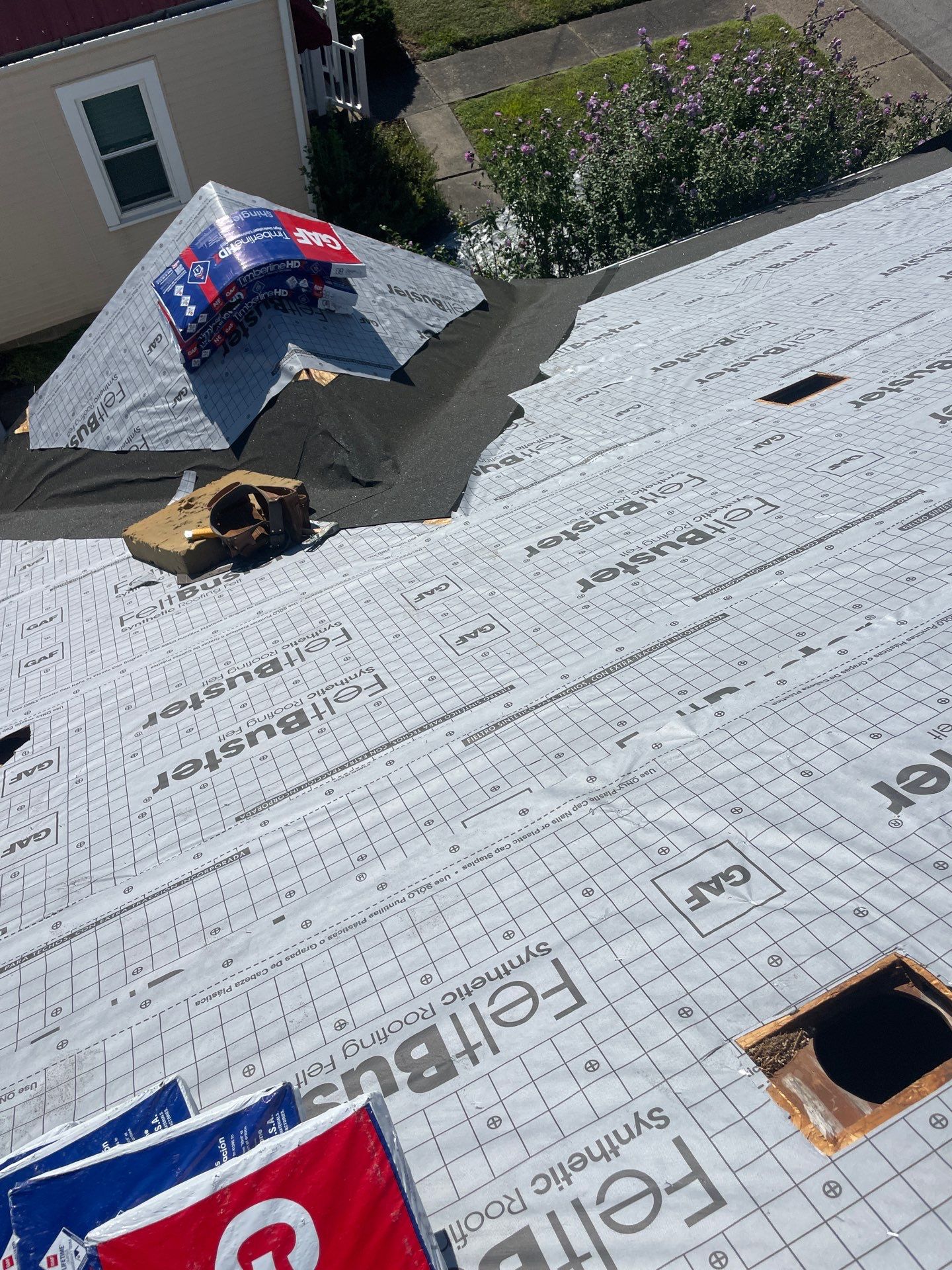 Residential Roofing Installation using GAF Timberline HDZ Charcoal by Rainstoppers Roofing