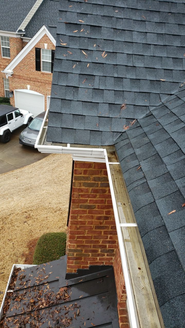 Gutter Cleaning using water by Power Wash Masters LLC