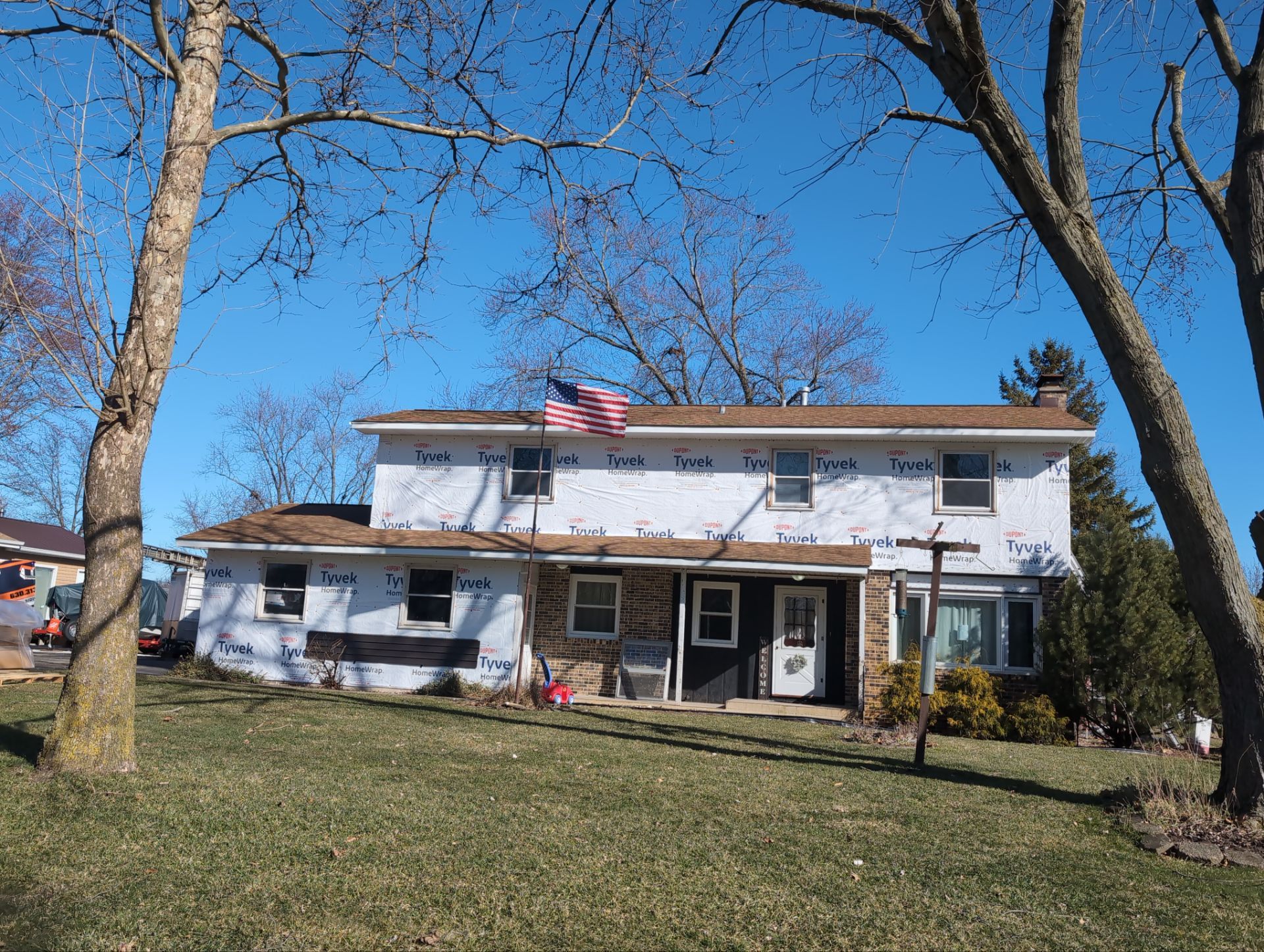 Vinyl siding replacement using CertainTeed Monogram double 5" vinyl siding  by AJ Exteriors & Roofing Inc.