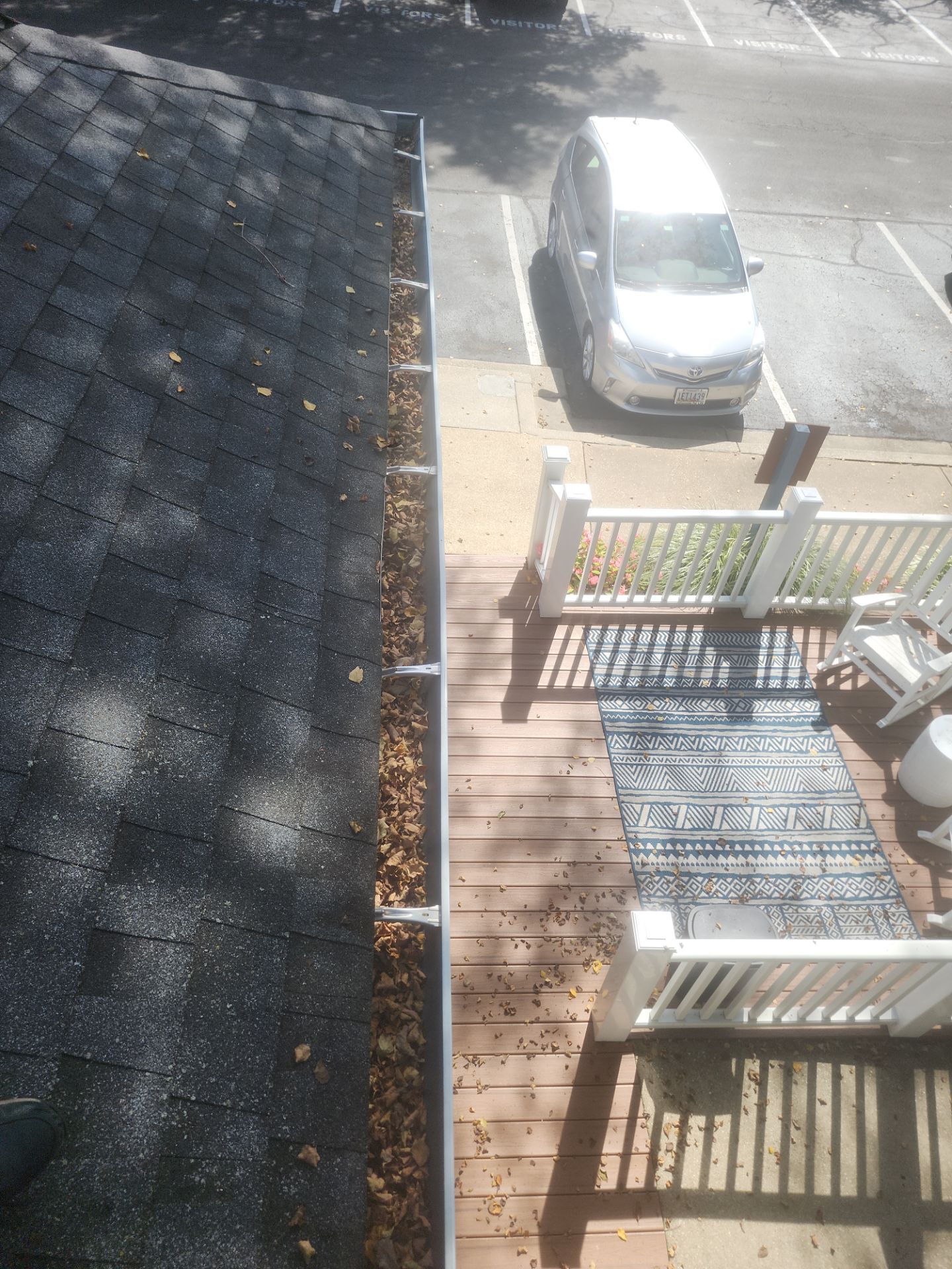 Commercial gutter cleaning Annapolis, MD before photo with filled gutters