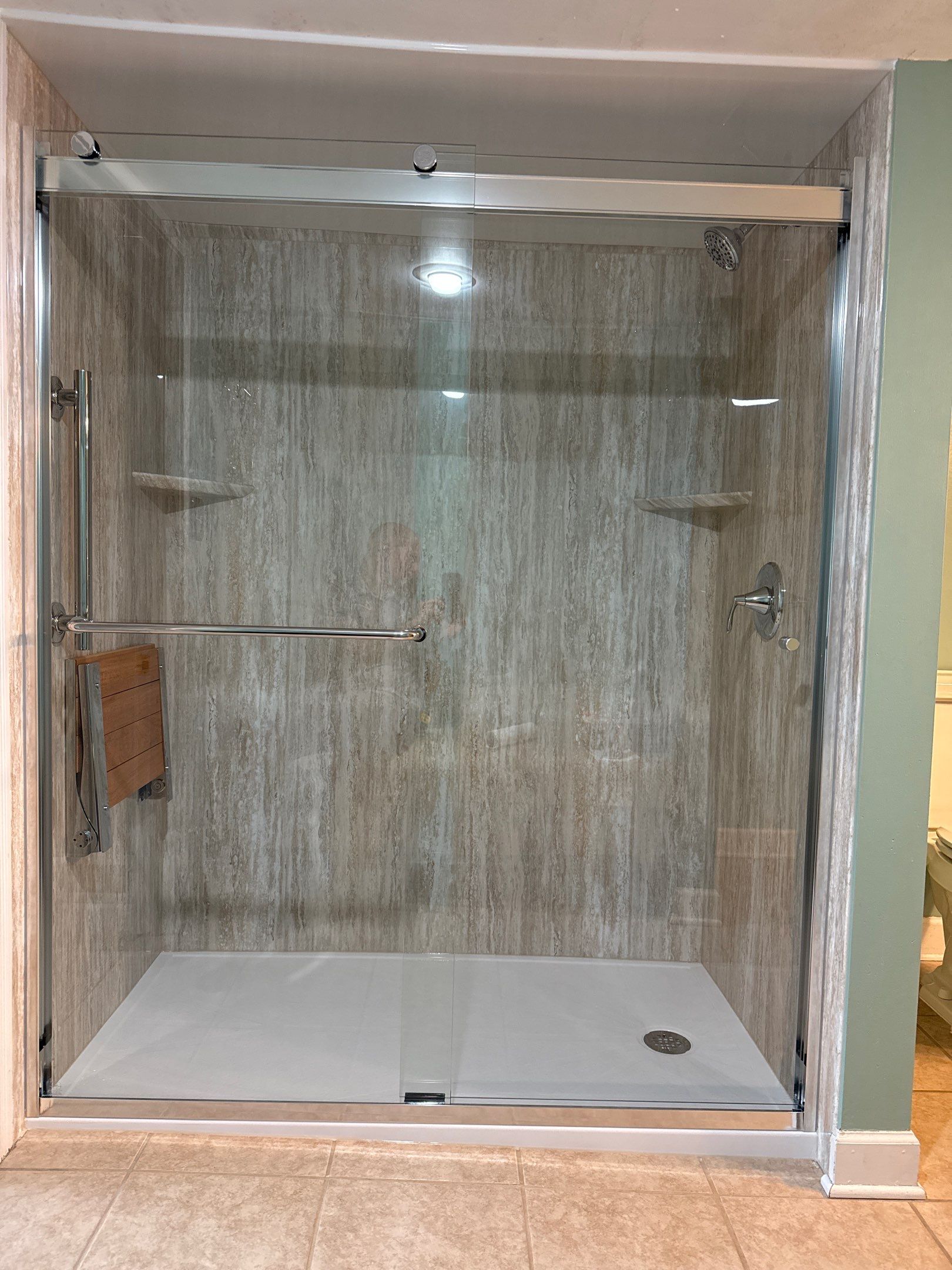 Jacuzzi Walk-In Shower Conversion and Bath Remodel in Traverse City by Rainbow Seamless Systems