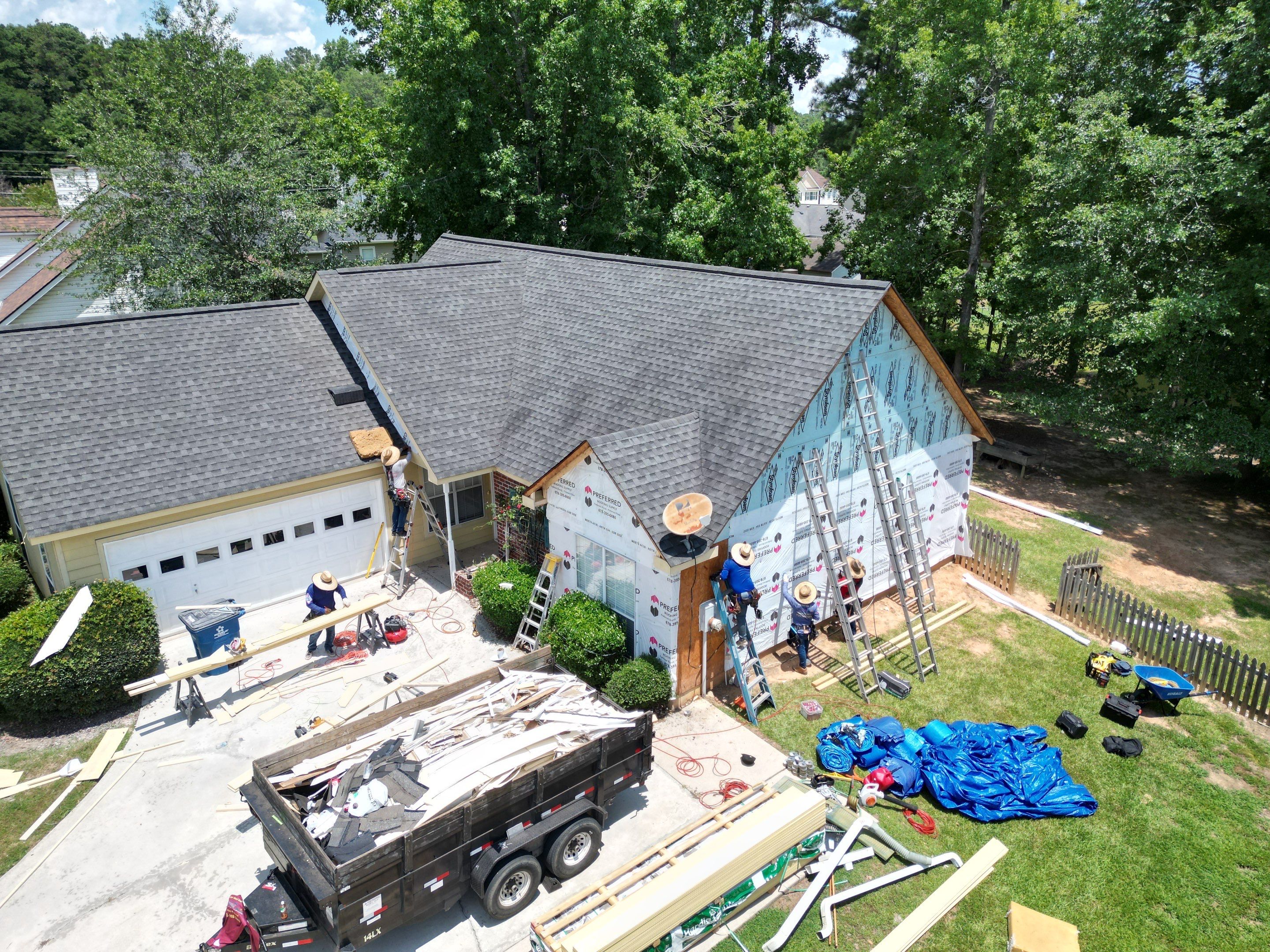 Siding replacement  by Deerfield Roofing LLC