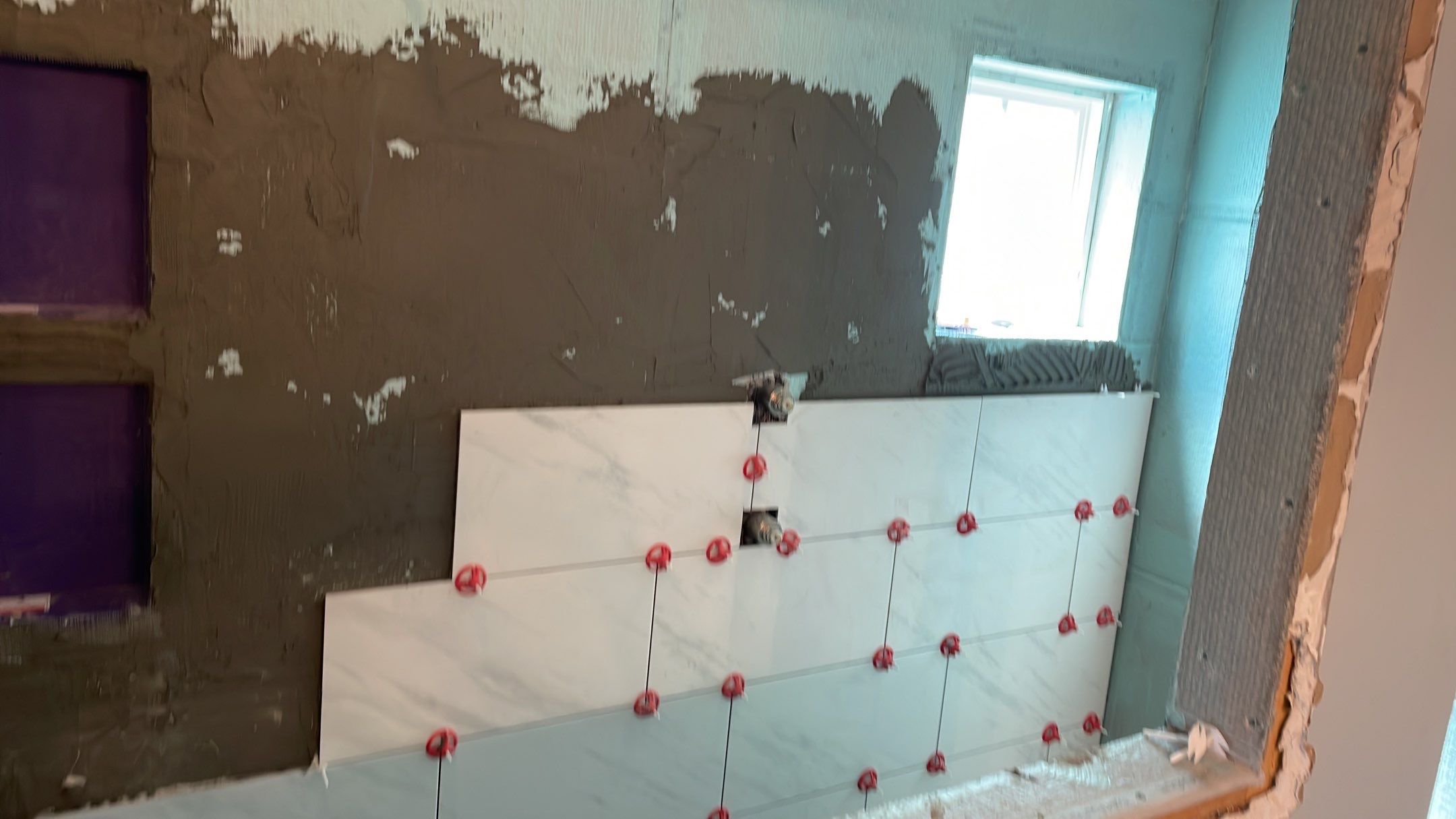 Bathroom Remodel using Decorative Tile by Footprints Floors of Coastal Carolina