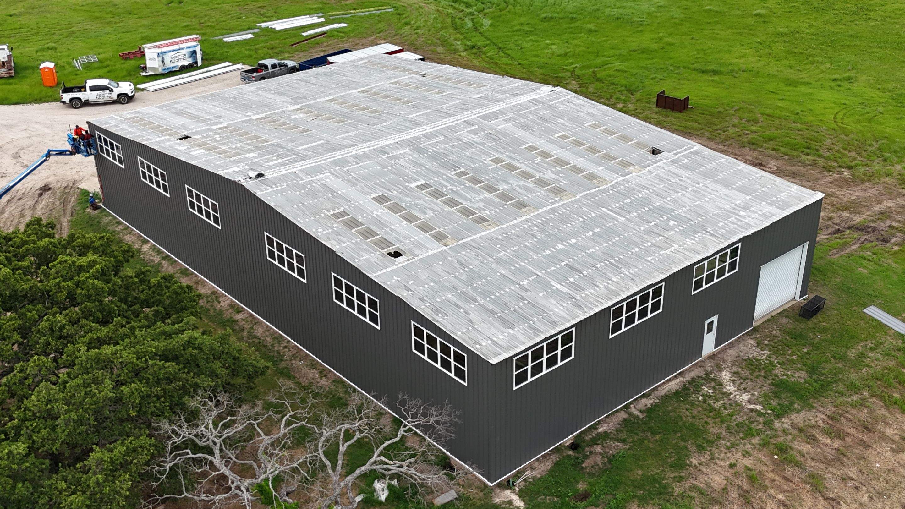 Complete Restoration with Skylight/Window Install - Greenville, TX by Hostetler Roofing