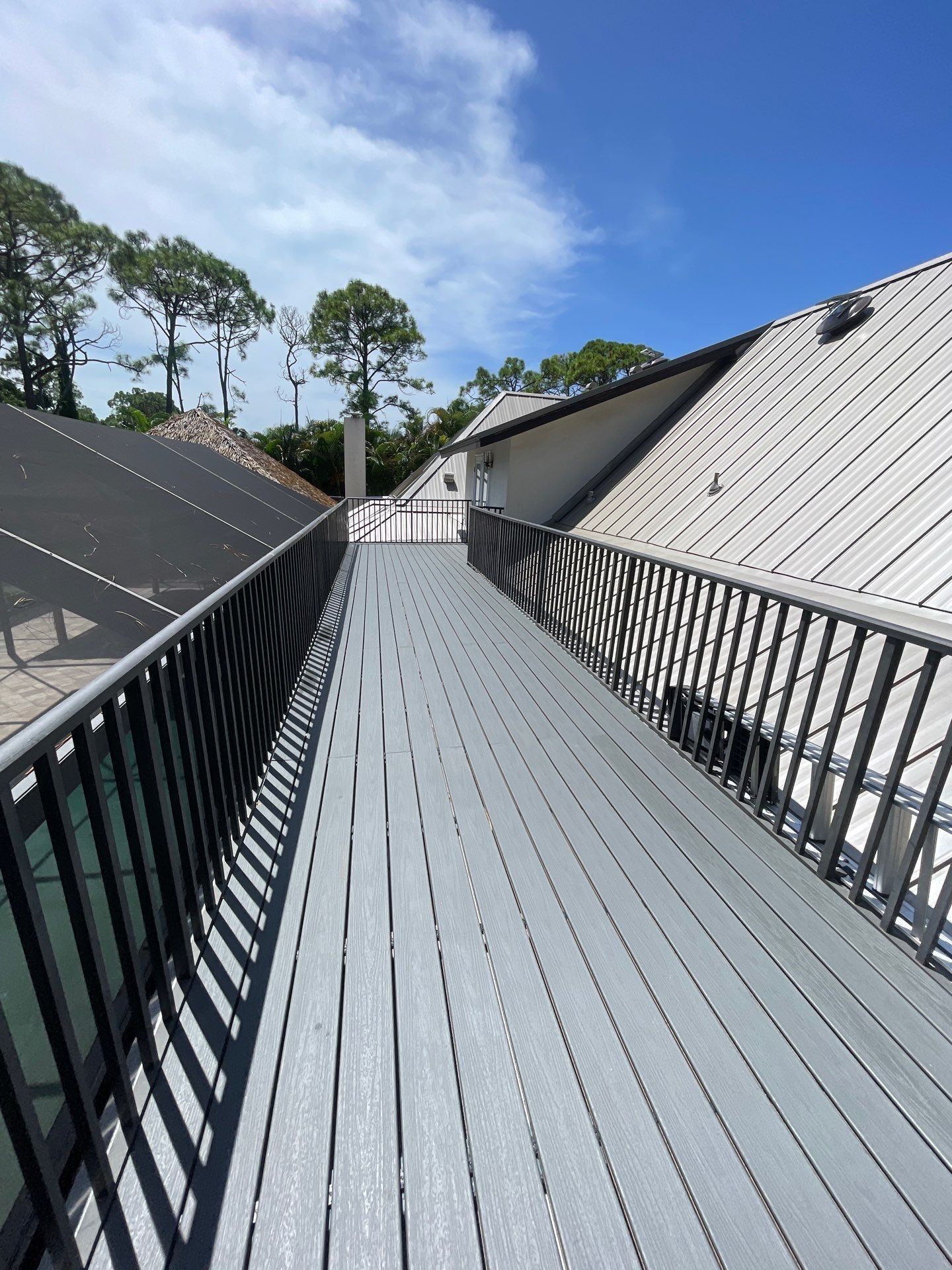 TPO Membrane- Trex Deck in Clam Shell color Balcony by Durabilis Roofing INC