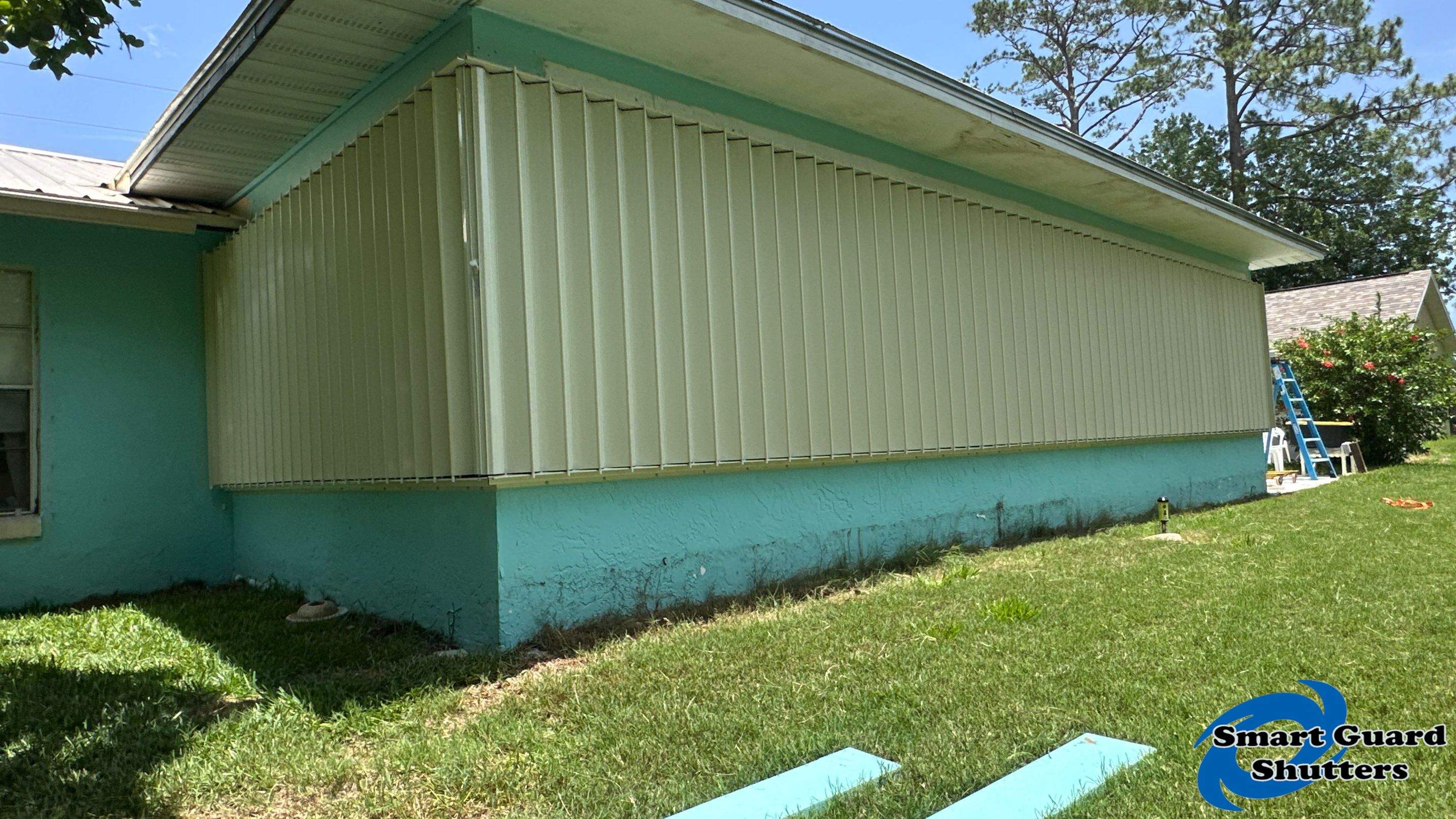 Accordion Shutter in Ivory by Smart Guard Shutters