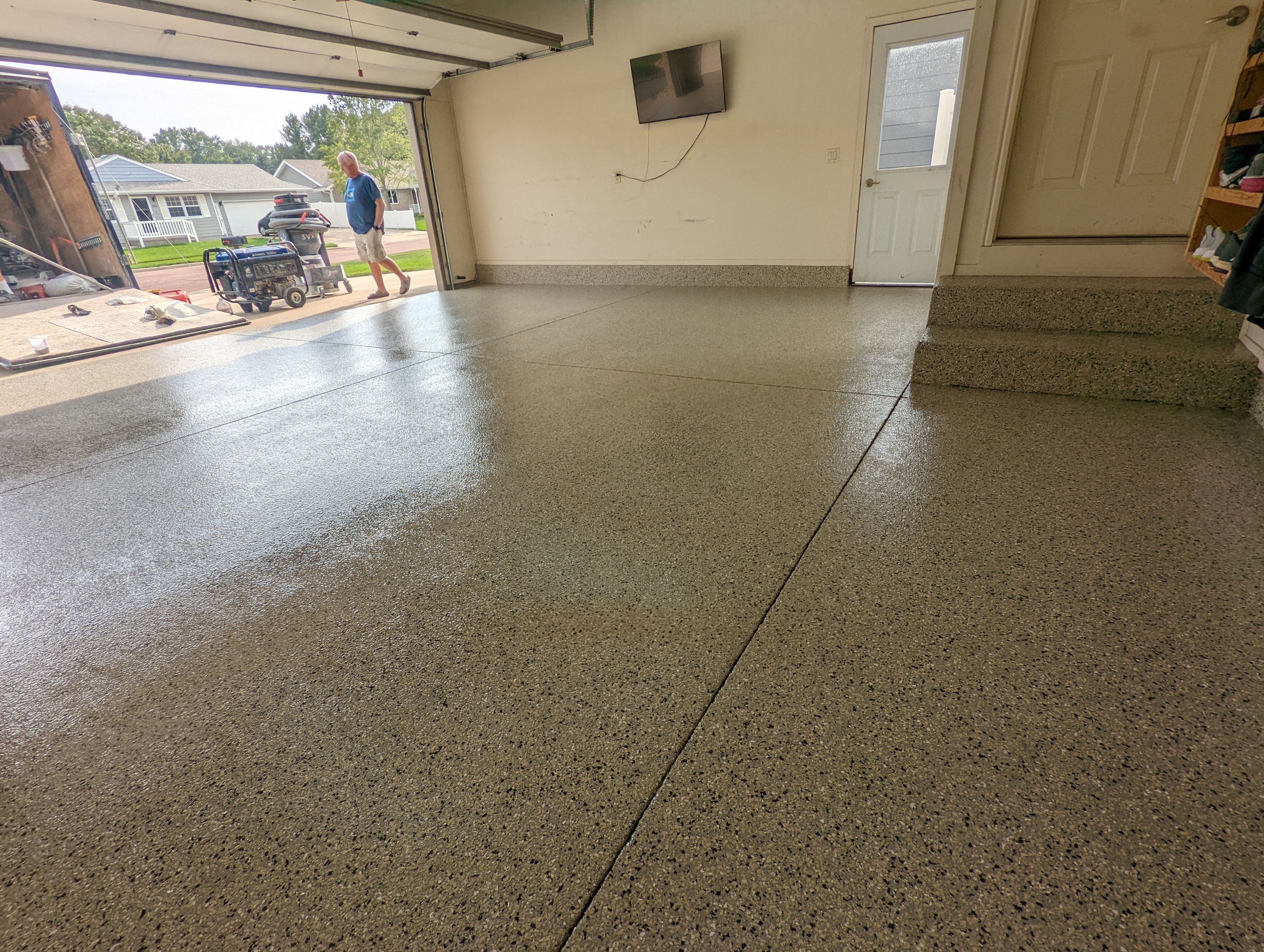 Garage using Mediterranean by Select Painting, Coatings & Garage Cabinets