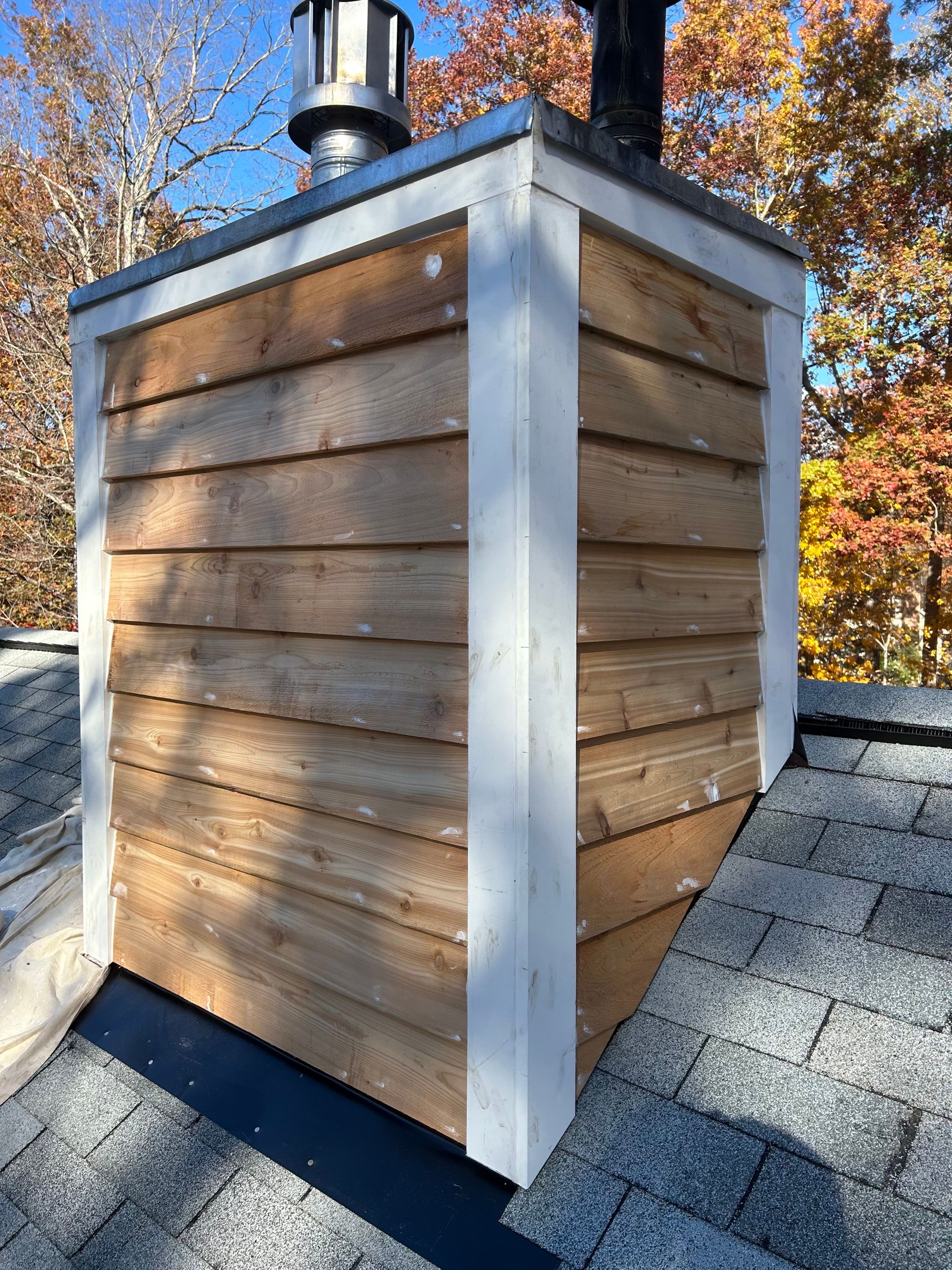 Roof Repairs/Chimney Siding  by Pro Performance Roofing