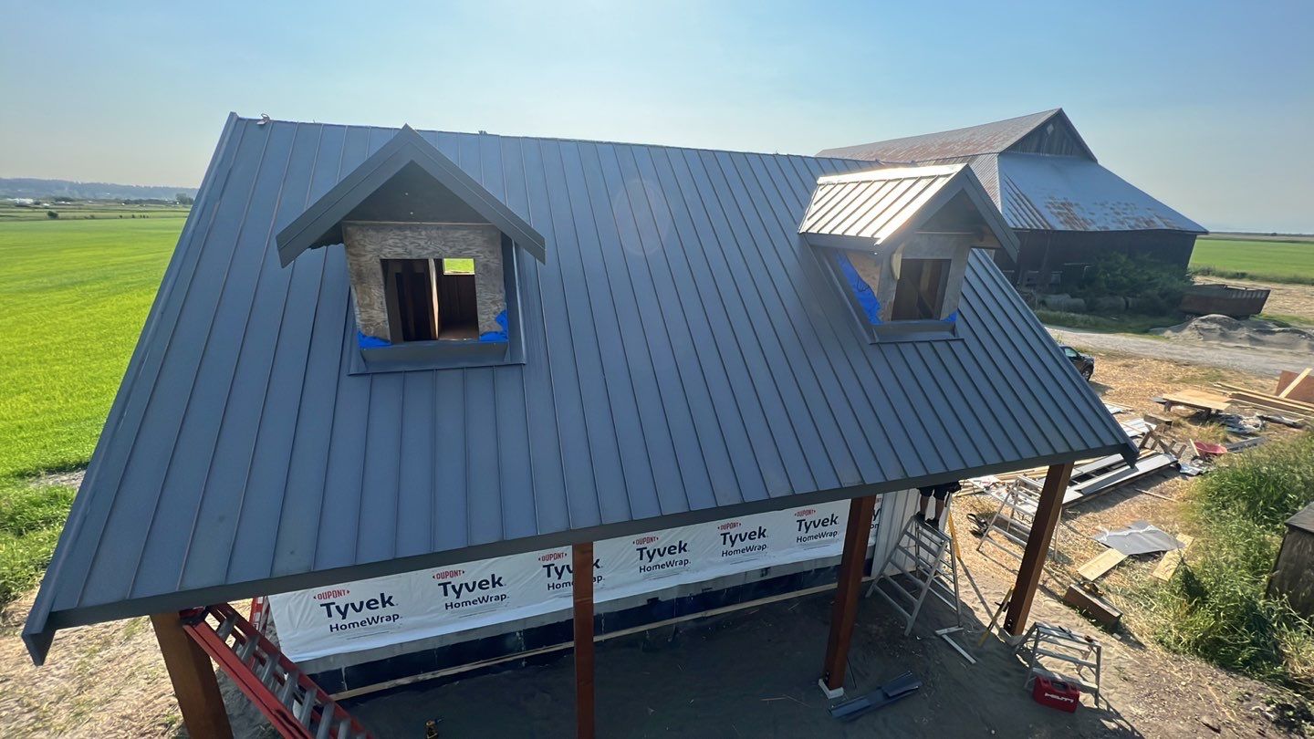 Agricultural Roofing Installation using 12" Prolok metal  by Top Notch Roofing Inc