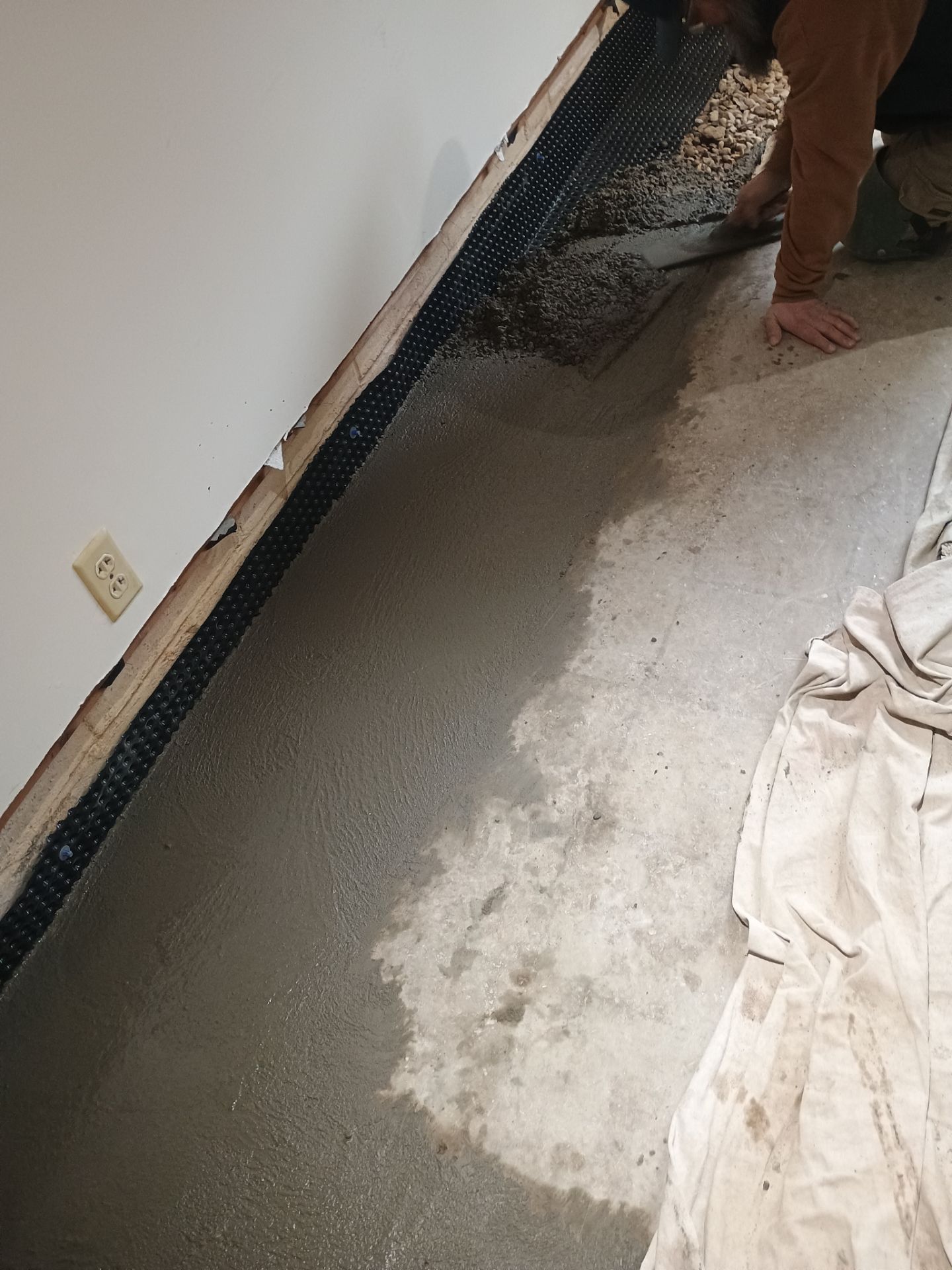 Completing the Connection for Lisa's Drain Tile System by Waterproofing Northeast