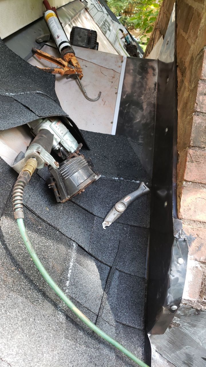 Residential Roofing Installation using Roof Replacement by American Roofing & Construction LLC