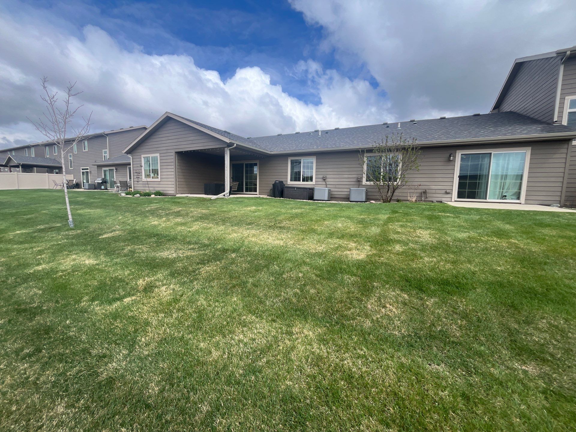 Exterior Painting for Multi-Unit Townhomes in Sioux Falls by Select Painting, Coatings & Garage Cabinets