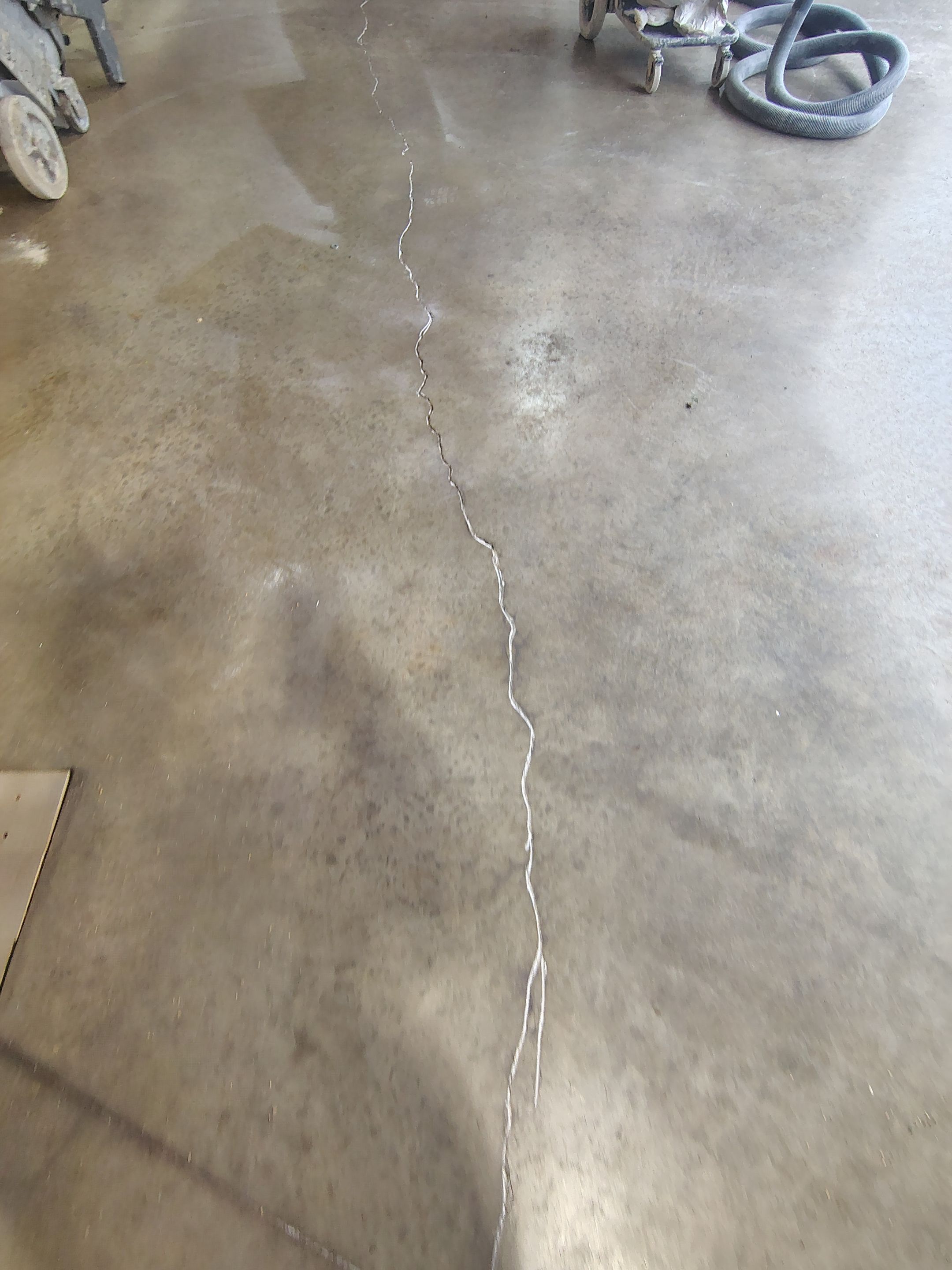 Sioux Falls Garage Concrete Grinding and Nightfall Decorative Chip Coating by Select Painting, Coatings & Garage Cabinets