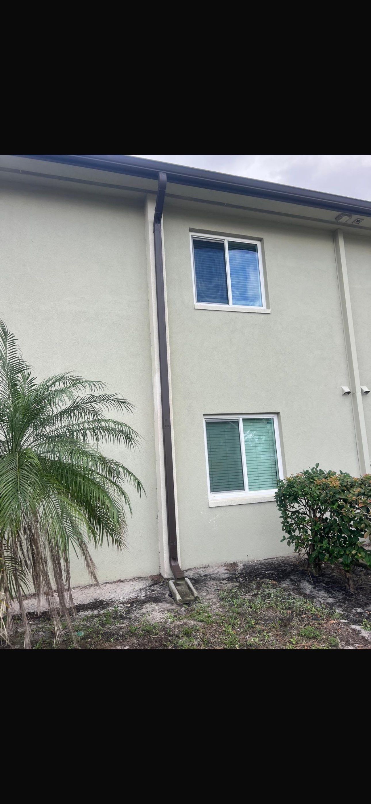 Bronze Downspouts Installation in Fort Myers FL by Gutter Professors