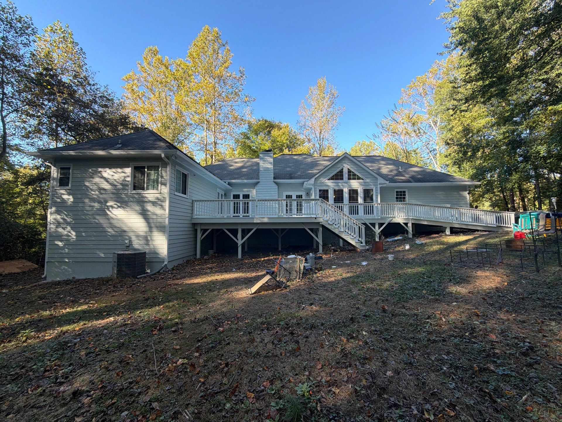 Exterior Residential Painting and Deck Refinishing in Canton, Georgia by Swift Home Renovations 