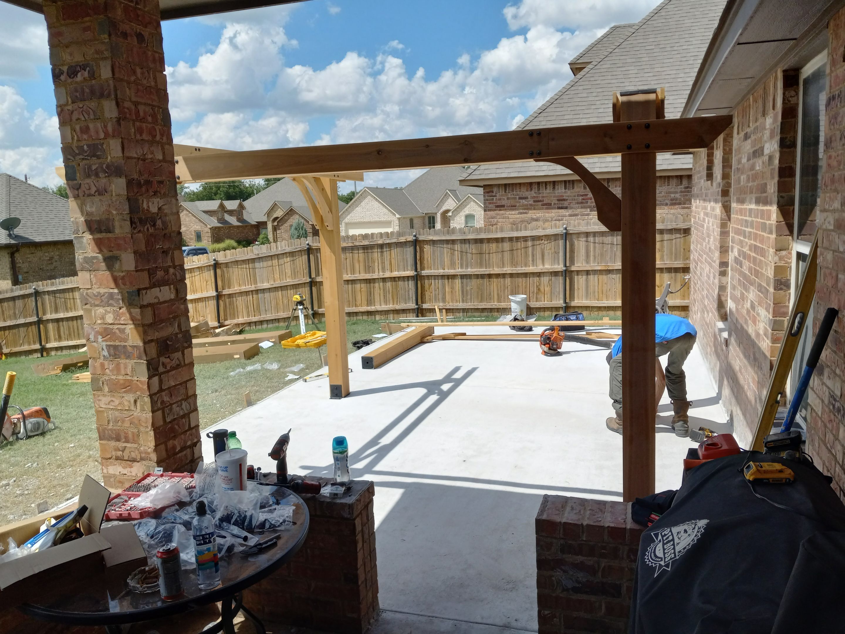 Concrete slab with Pergola by Clays Services Inc