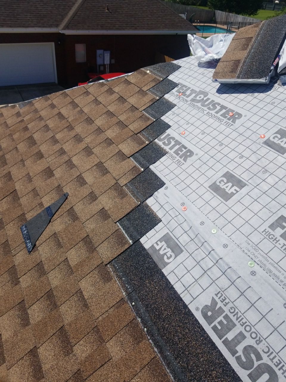 Residential Roofing Installation using Roof Replacement by American Roofing & Construction LLC