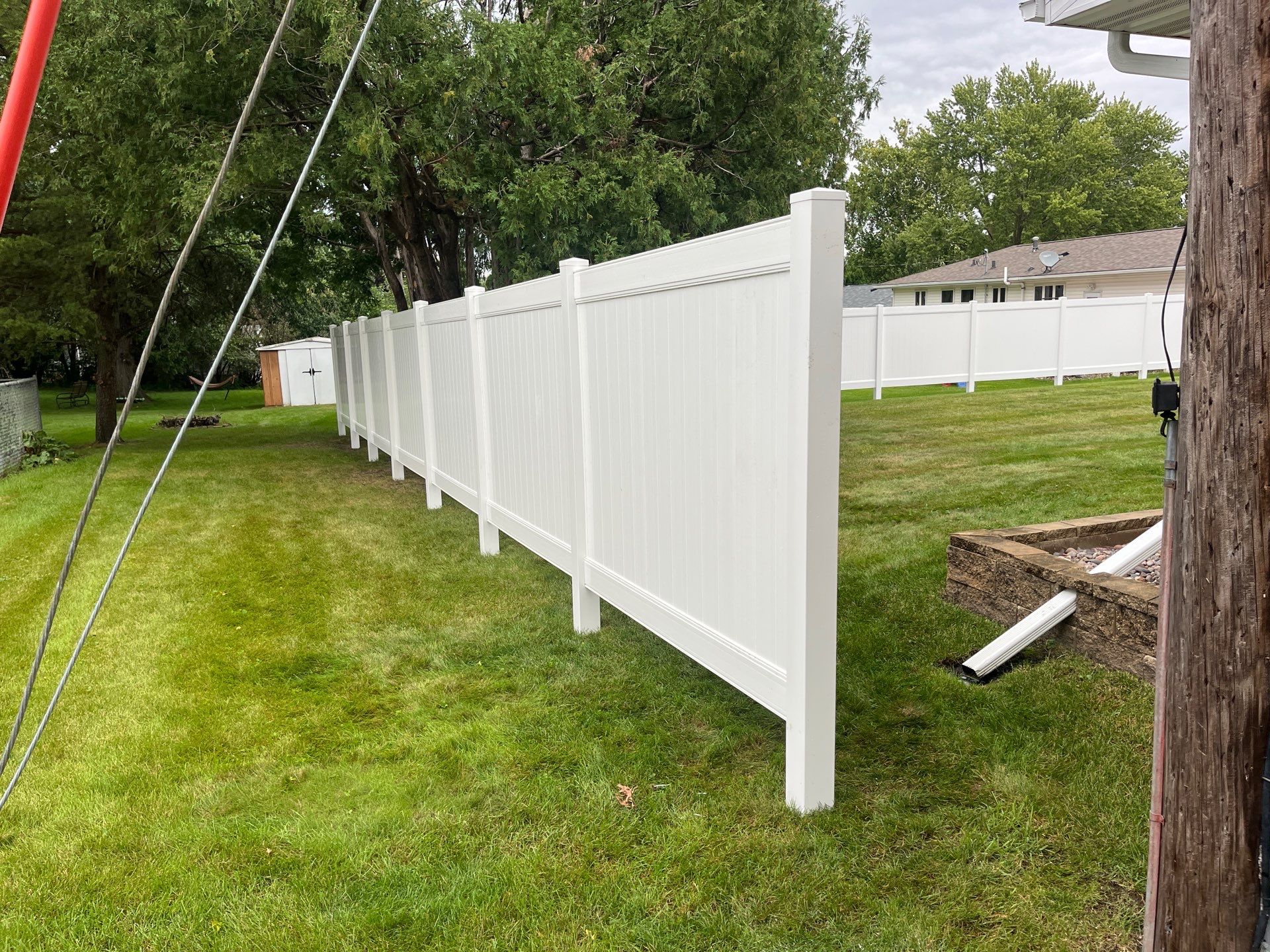 Residential White Vinyl Privacy Fence Enclosure in Waterloo by Perfect Picket Fence and Stain