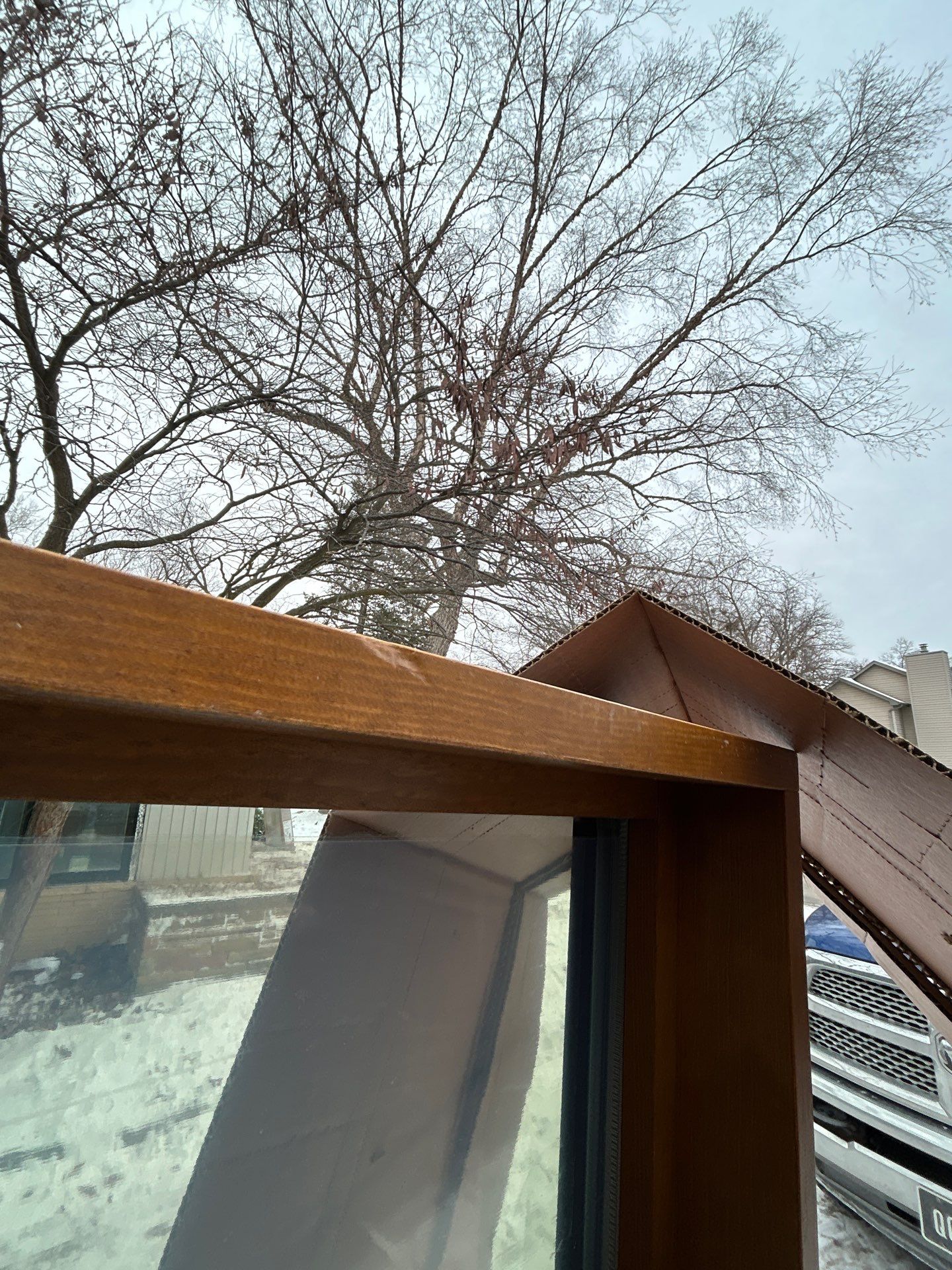 Black-Frame Pella Lifestyle Upgrade on a Partial Brick Home by United Windows and Siding LLC