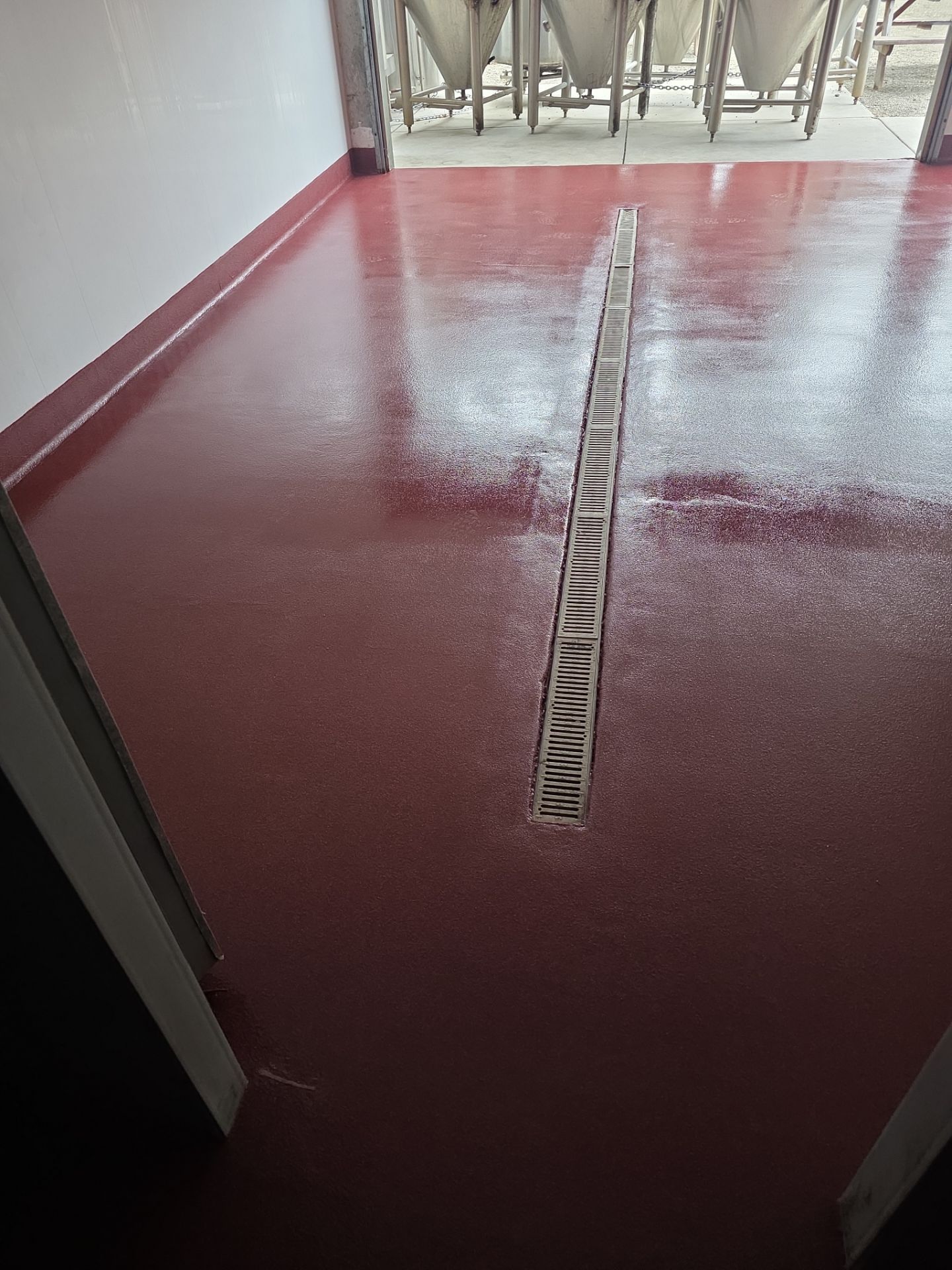 Industrial Red Quartz Polyurea Floor Installation for Atascadero Brewery by MGP Coatings