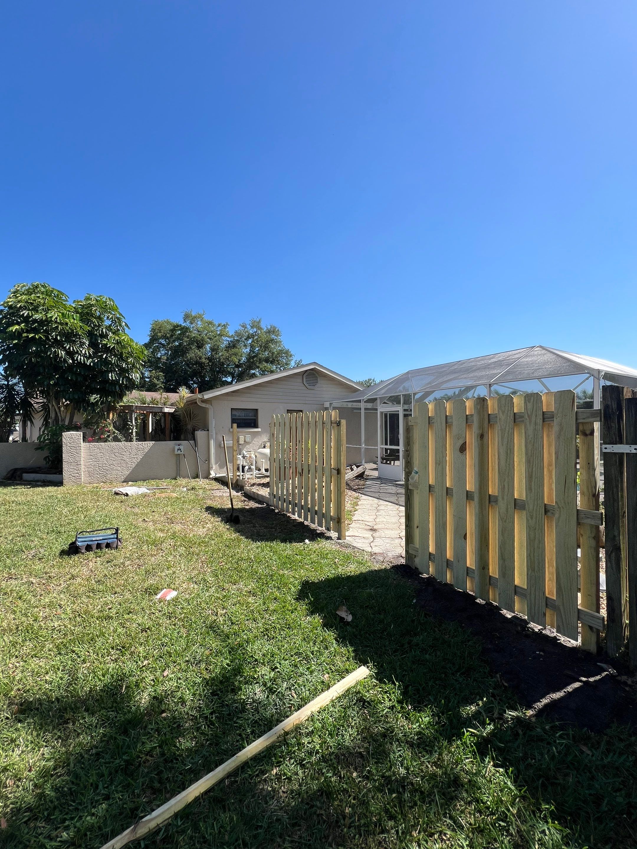 Wood Fence Installation using Shadowbox Wood Fence by Asap fence and gates, LLC