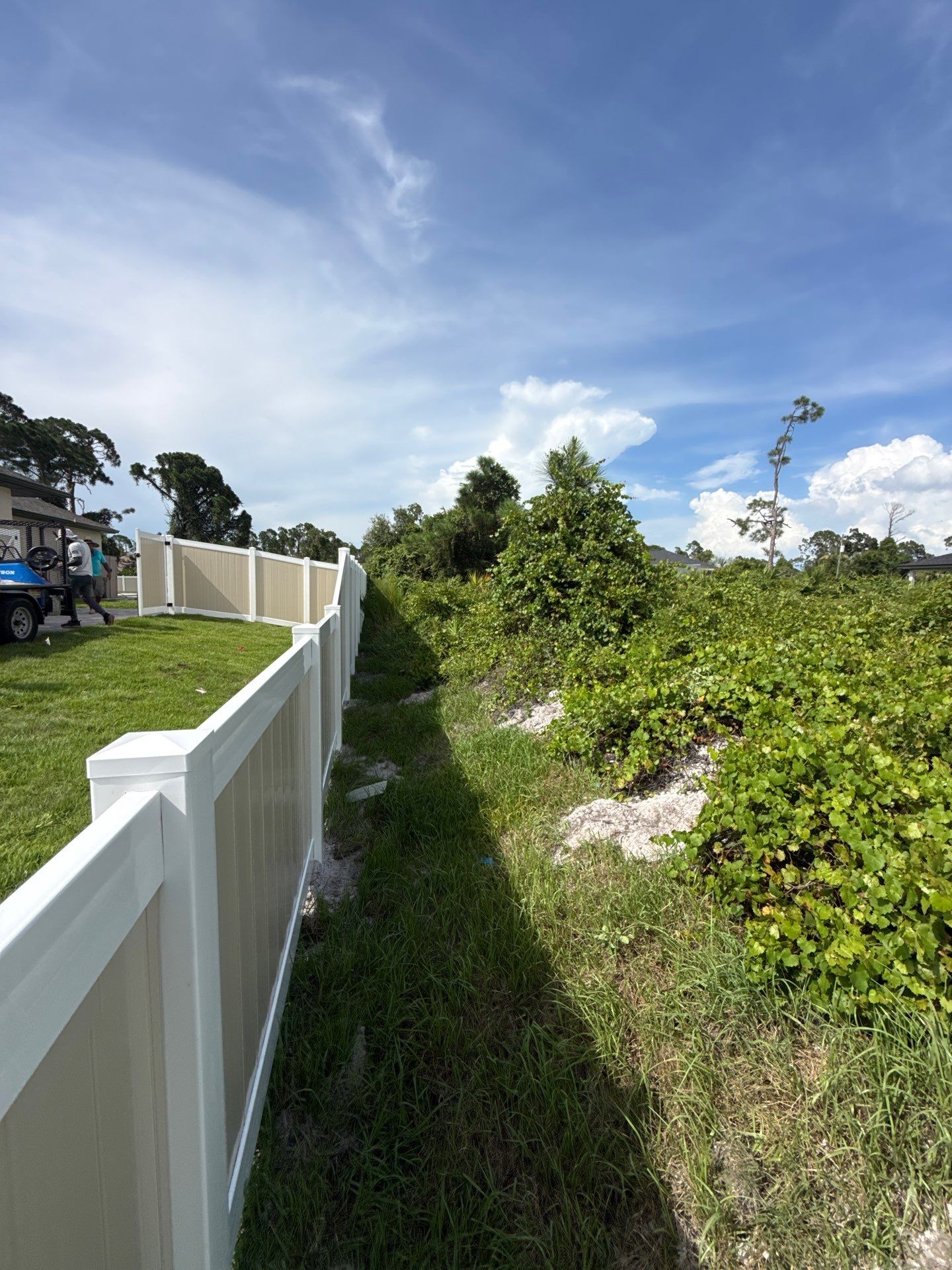 Custom Two-Tone Vinyl Privacy Fence Installation in North Port by True Fence LLC