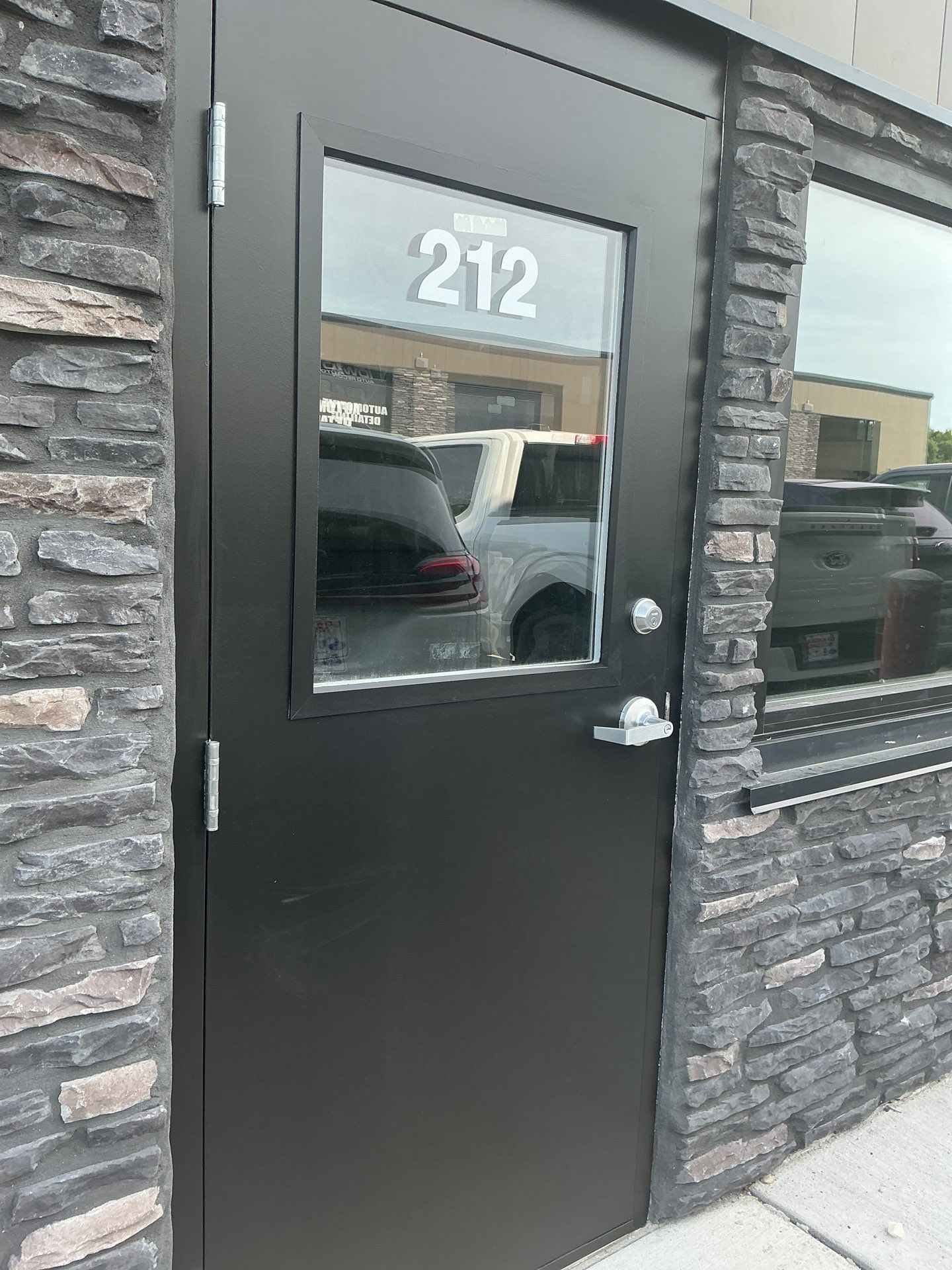 Commercial Exterior Door Repaint by Midwest Paint LLC