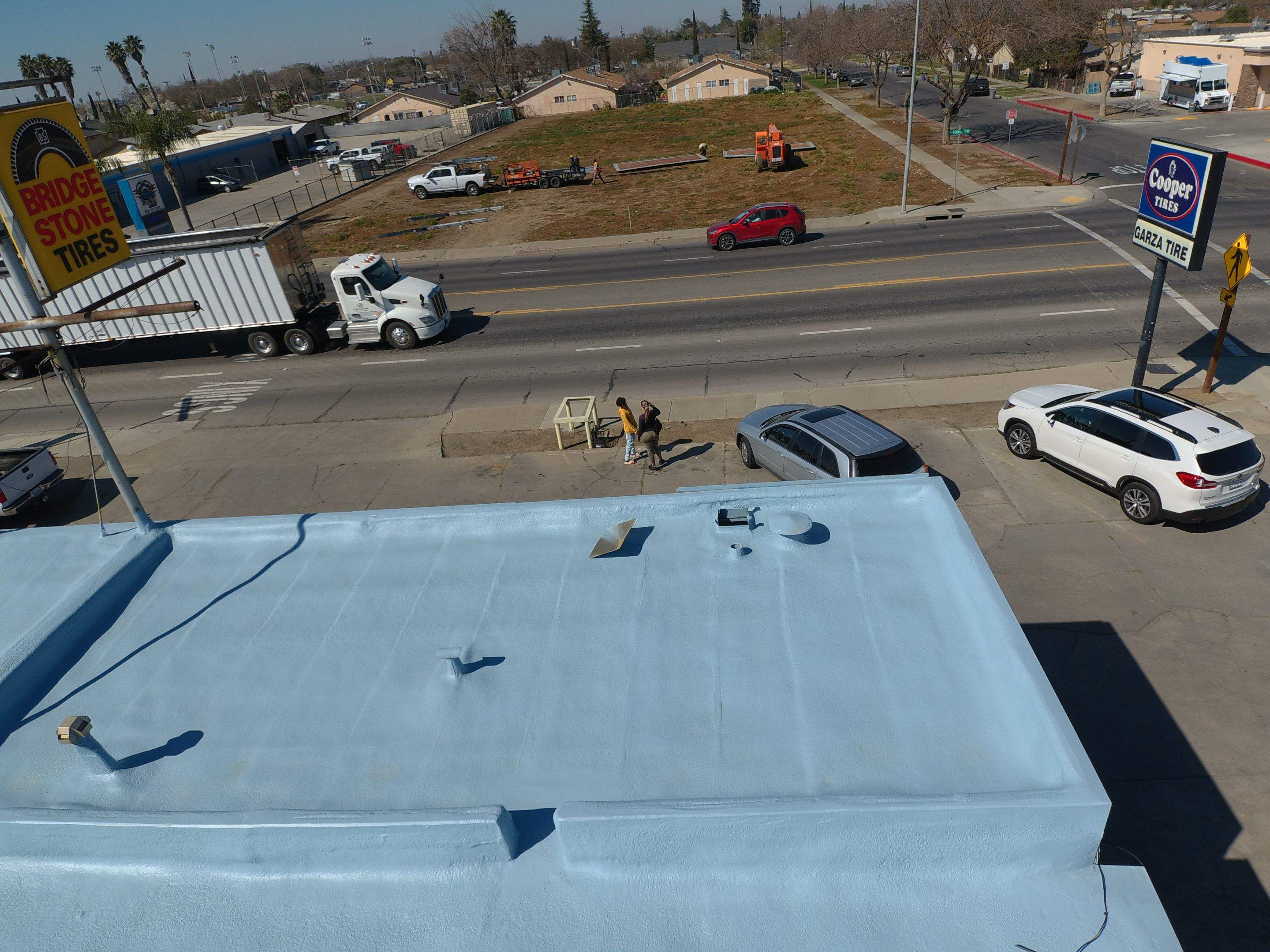 Spray foam and coatings using Conklin Benchmark/PUMA XL coatings and spray foam by Straight Edge Roofing Inc