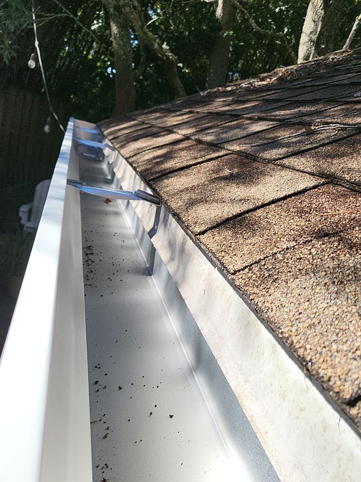 Seamless Gutter Installation using K-Style Seamless Gutters and LeafBlaster Pro Gutter Guards by Gutter Professors