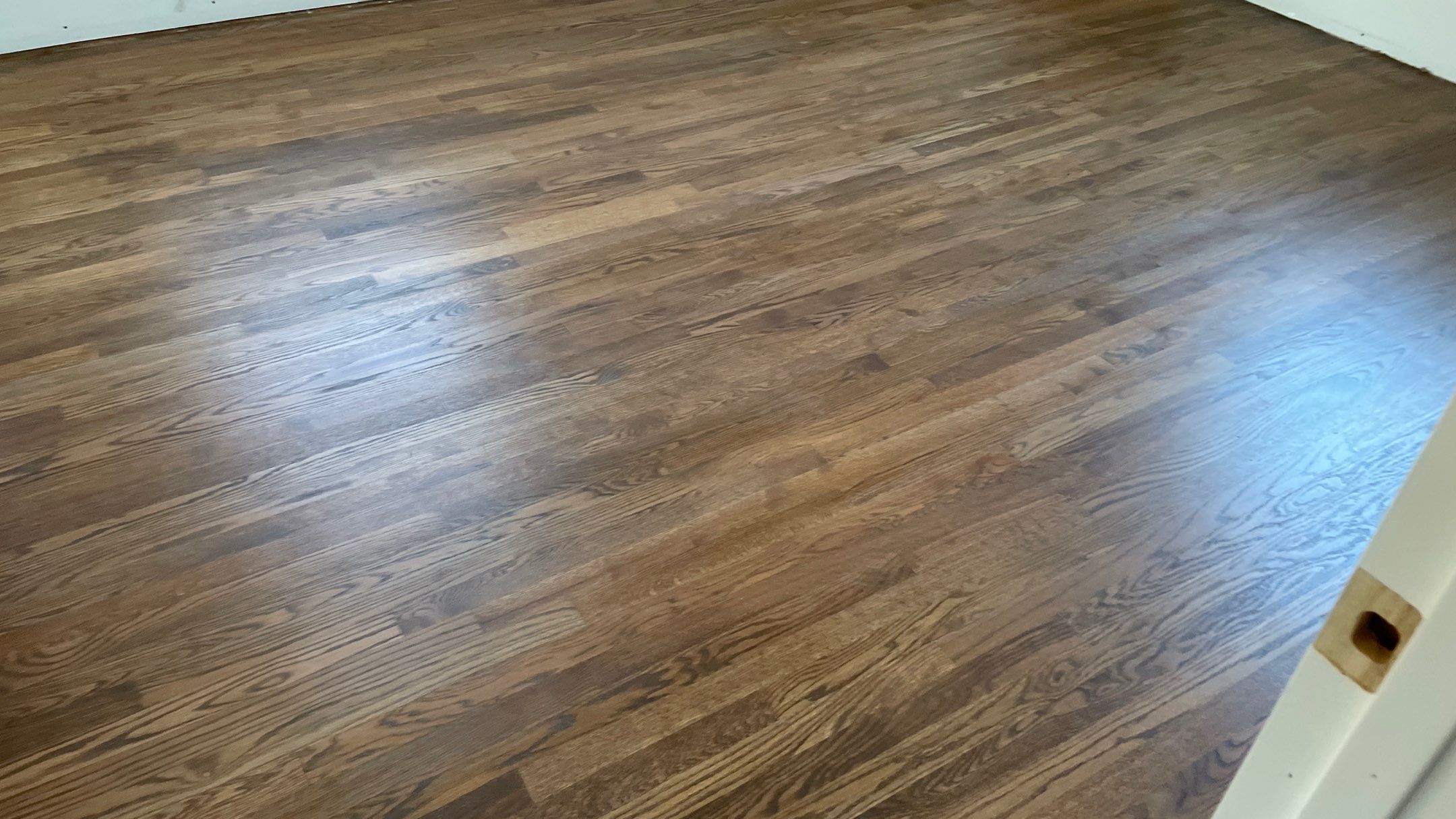 Remodeled Home with new tile floors, Showers and Refinished Oak Floors with stain and Waterbased Finish by Footprints Floors of Coastal Carolina