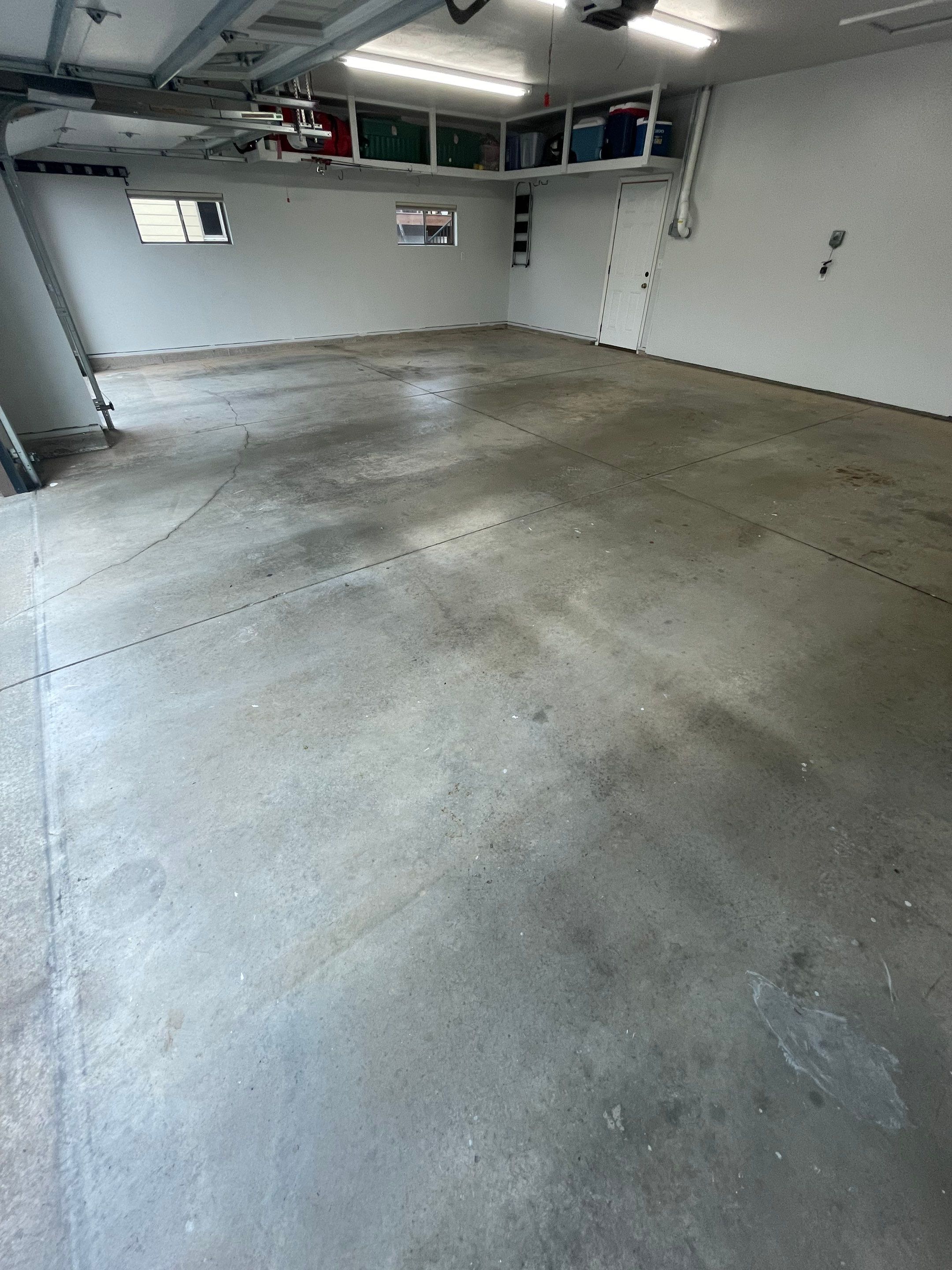Multi-Car Garage Floor Coating and Crack Repair in Tea by Select Painting, Coatings & Garage Cabinets