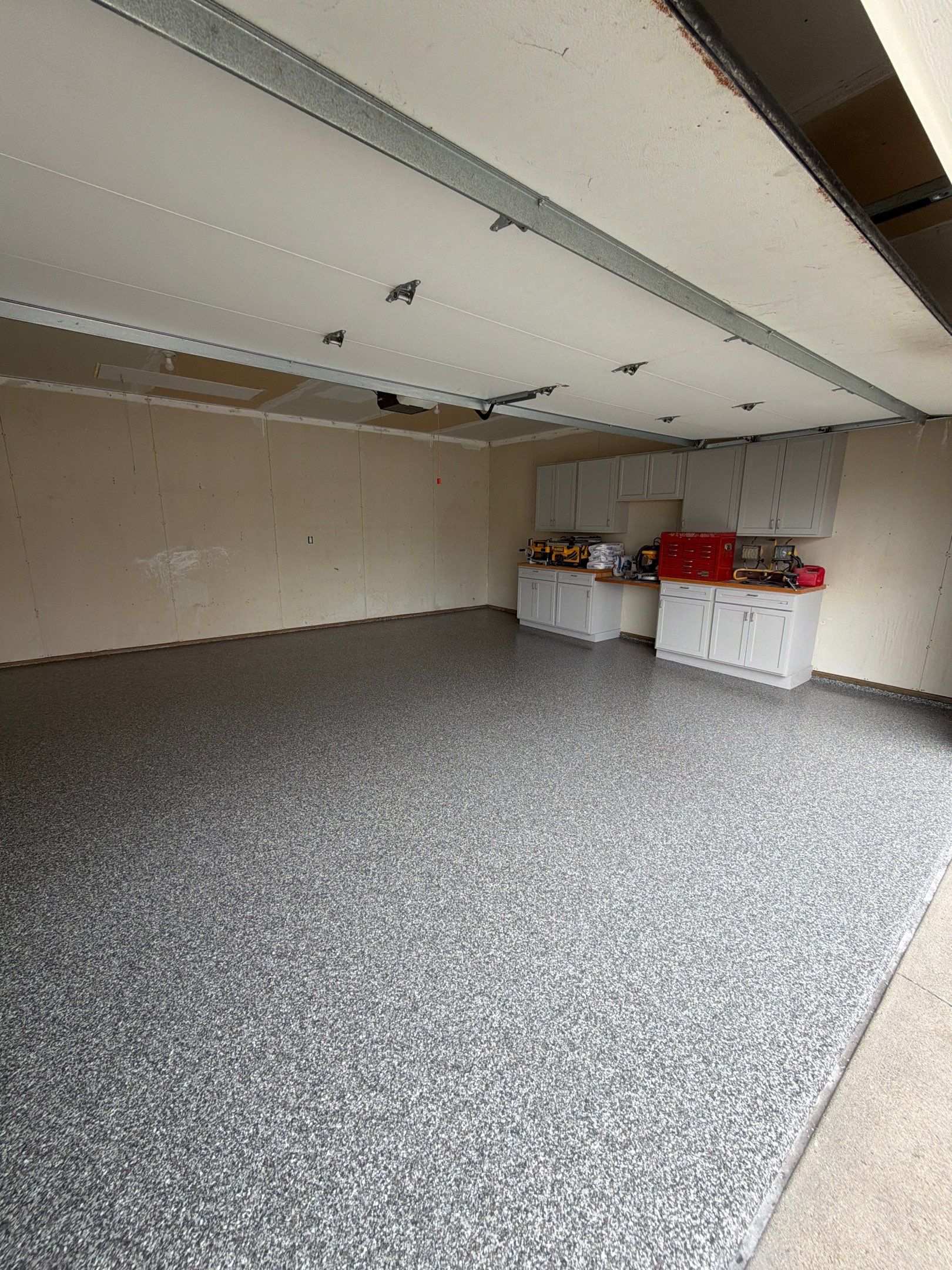 Ames Garage Floor Coating - Epoxy Replacement by Revival Concrete Coatings