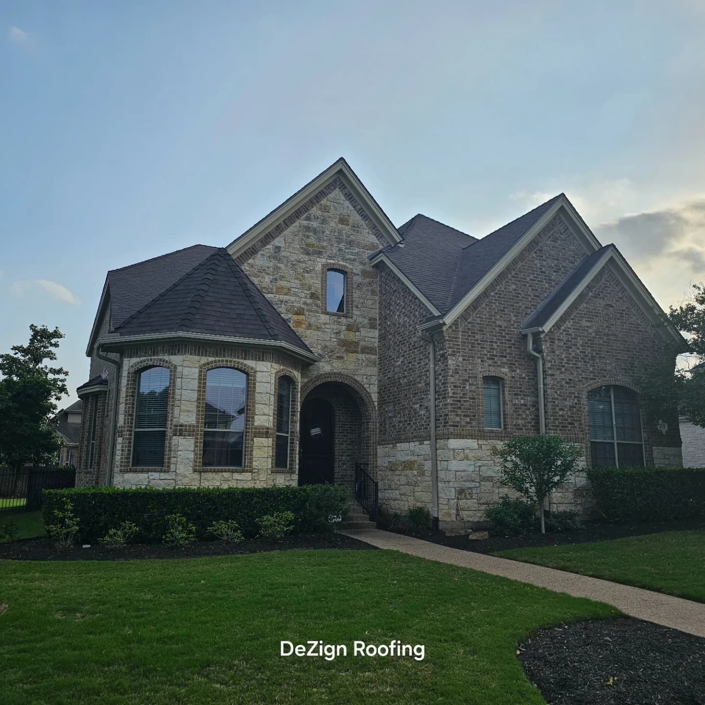 Residential Roofing Installation using Malarkey Vista Shingles Color Heather by DeZign Roofing & Exteriors