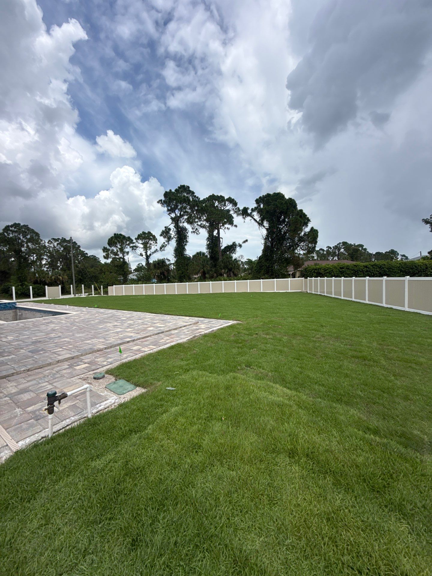 Custom Two-Tone Vinyl Privacy Fence Installation in North Port by True Fence LLC