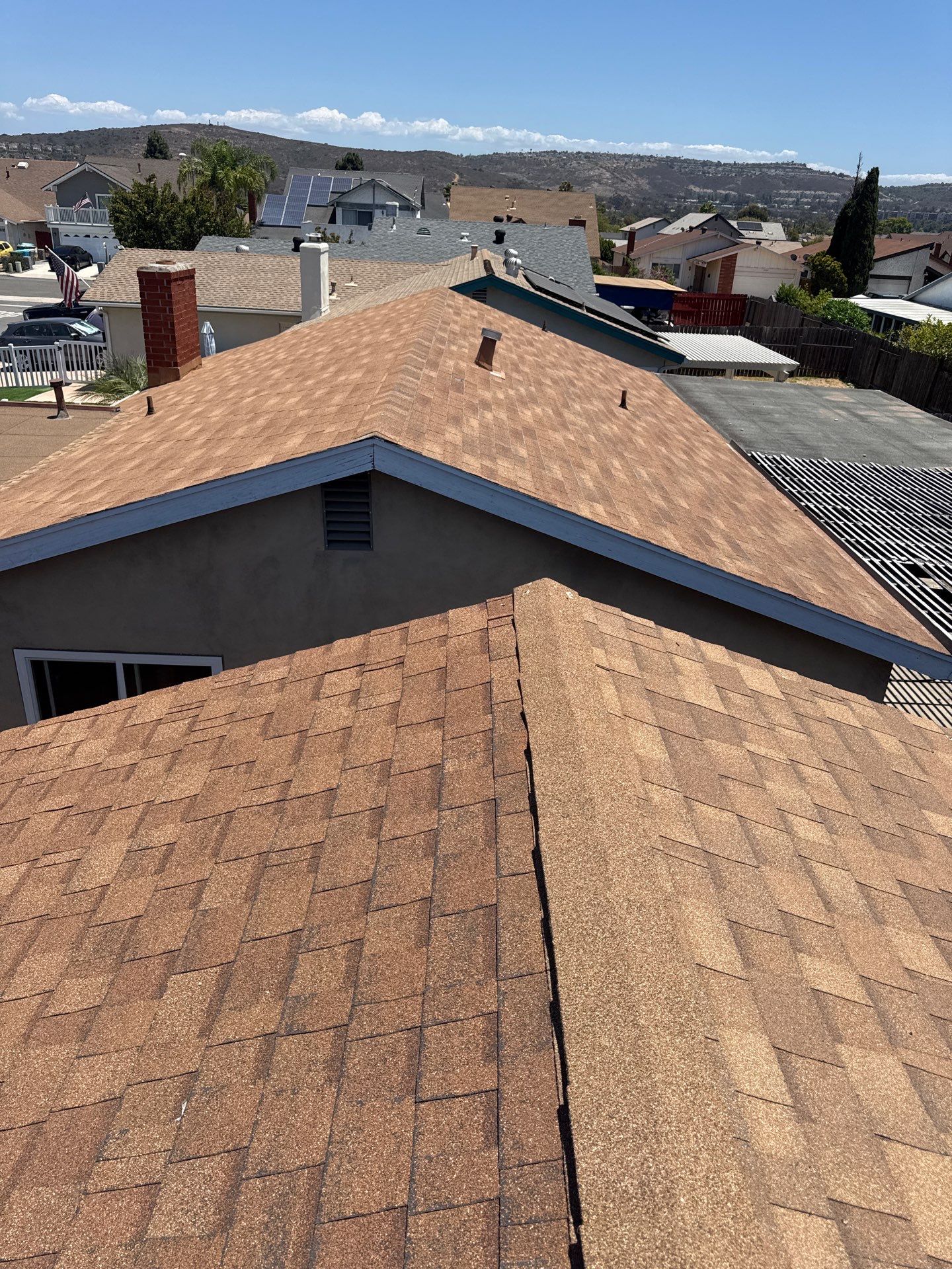 Asphalt Shingle Roof Rejuvenation and Vent Sealing in San Diego by Reliable Roofing San Diego Inc.