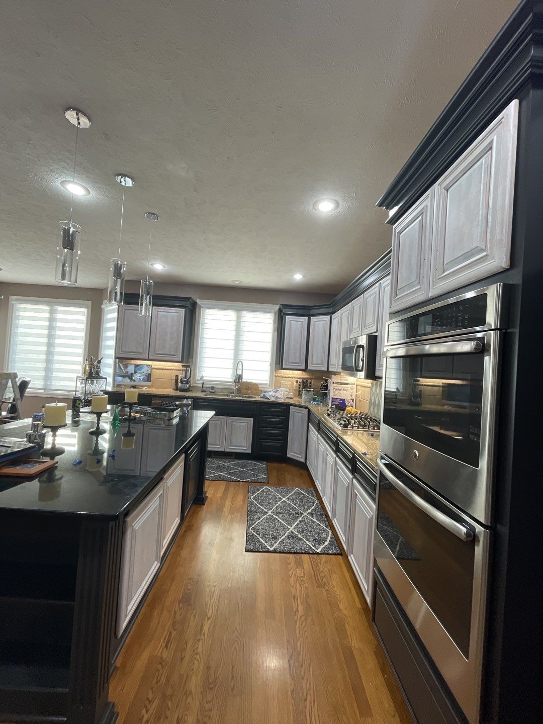 Painting Hardwood using Sherwin Williams paint by Lightning Exteriors
