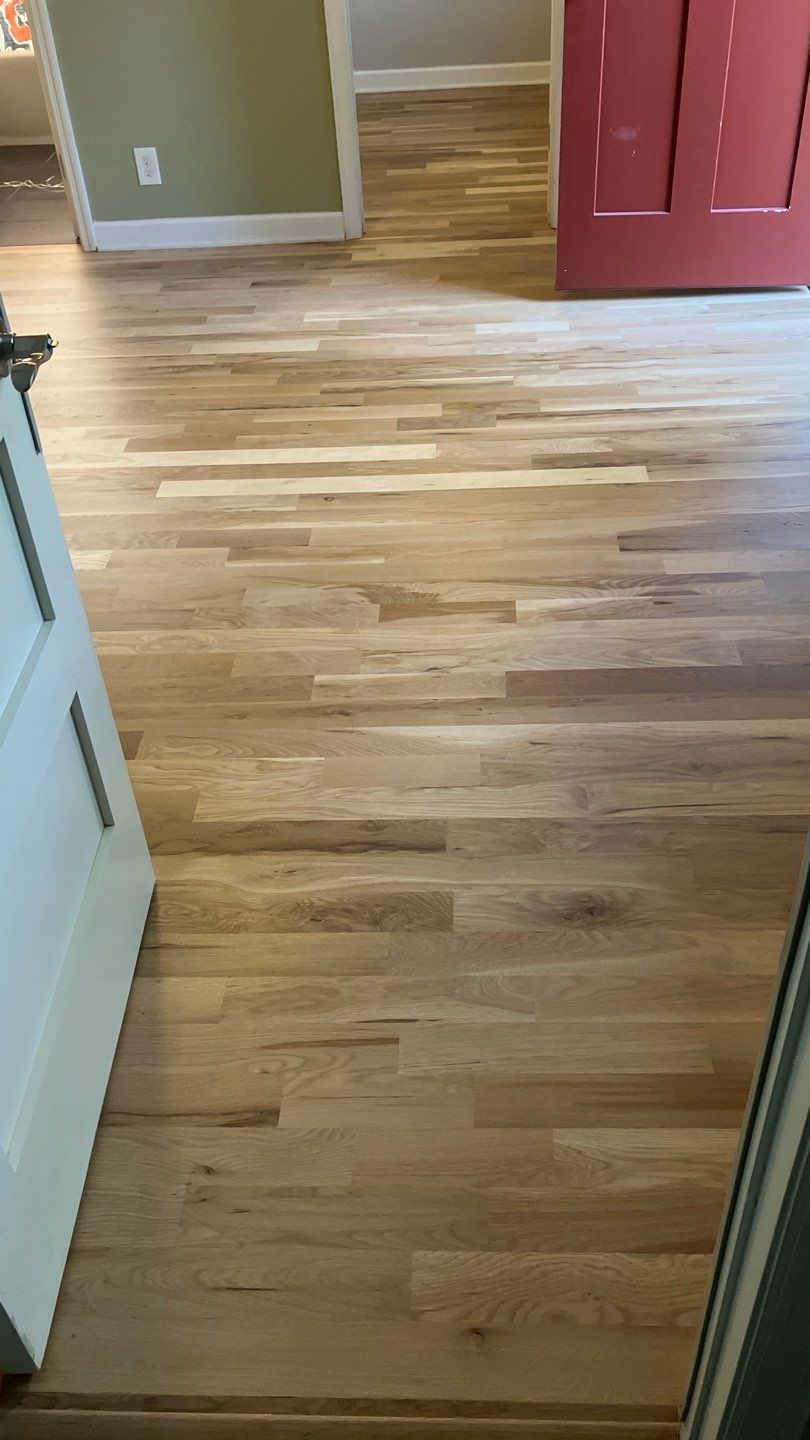 Replaced Carpet with New Hardwood Floors  by Footprints Floors of Nashville