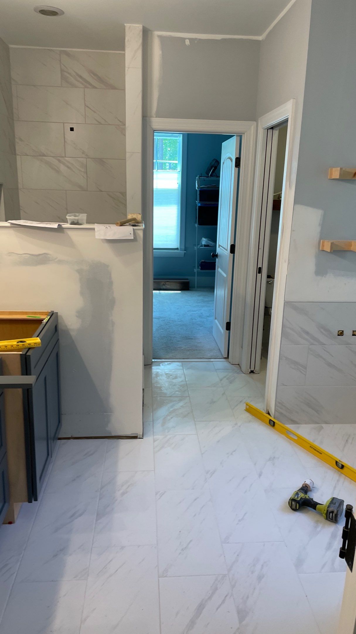 Bright Bathroom Remodel with Wall Removal, Stand Alone Tub and New Vanity by Footprints Floors of Coastal Carolina