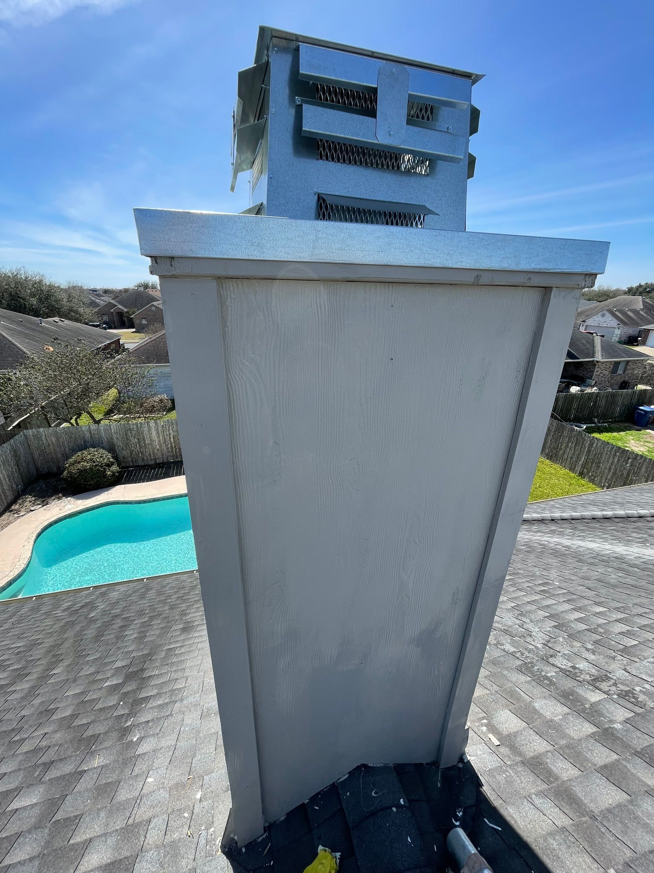 Residential Roofing Repair Replacing Chimney Cap by Lighthouse Roofing