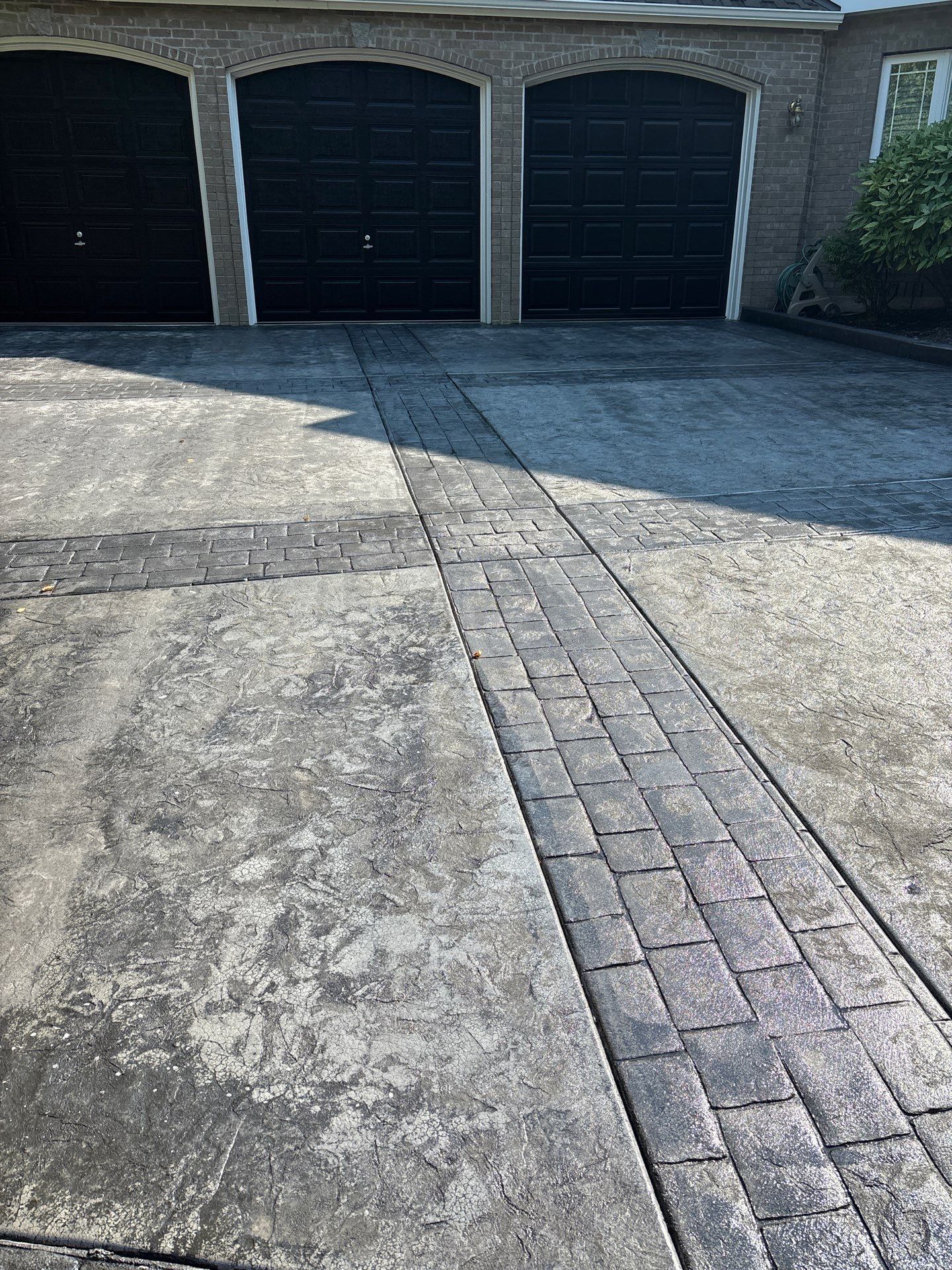 Multi-color Stamped & Sealed Concrete Driveway Renovation | Mukilteo by Jireh Asphalt & Concrete Inc